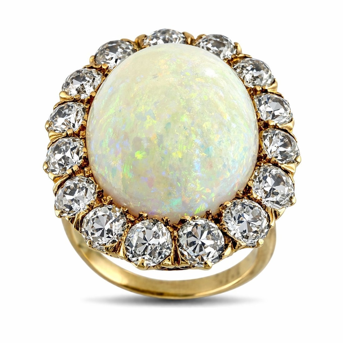 Ring - 10 kt. Yellow gold, Exclusive 10K Yellow Gold Opal and 1.60ct Diamond Ring - 1.60ct. tw.: Exclusive 10K Yellow Gold Opal and 1.60ct Diamond RingA charming and distinctive ring centered by a luminous opal with a soft play of color. The surrounding diamonds create a bright frame that gives t
