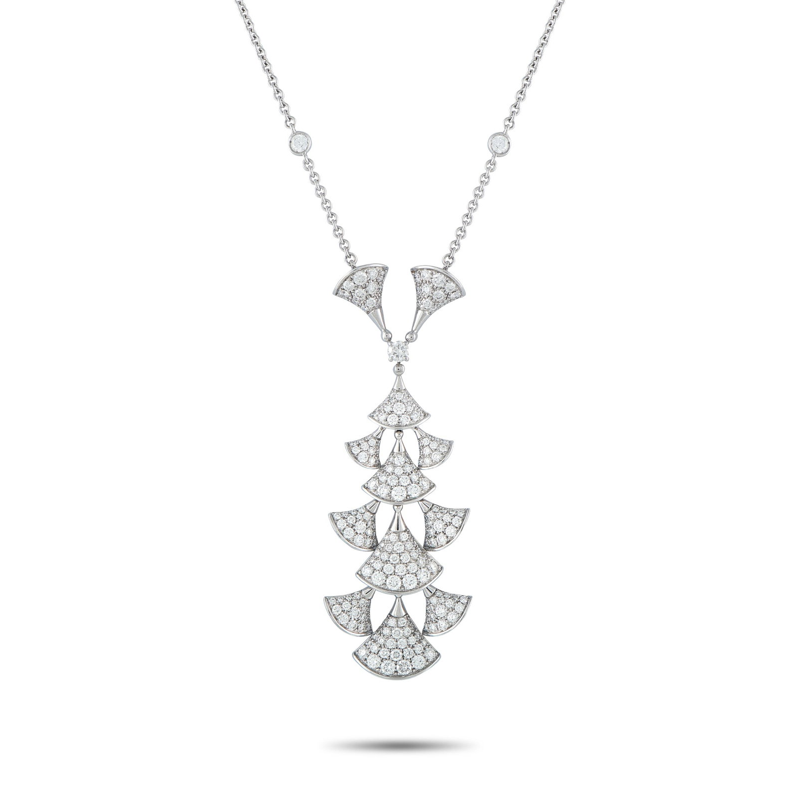 BVLGARI Divas Dream 18K White Gold 3.75ct Diamond Pendant: This Bvlgari Divas Dream necklace features feminine design elements that mimic the curved, fan-shaped motifs found in Roman architecture. Stylish and statement-making, this Platinum necklace comes to 