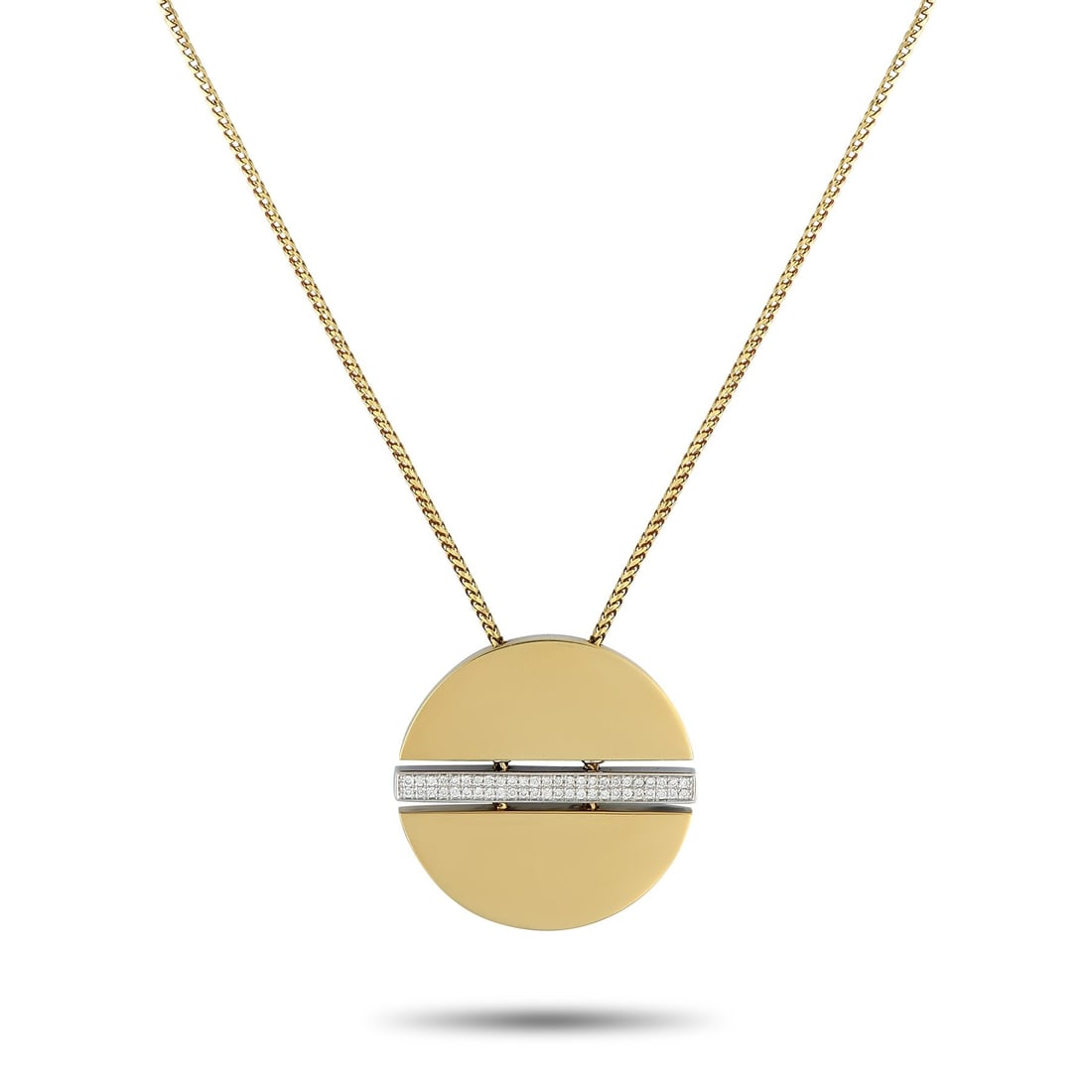 Movado 18K Yellow Gold 0.25ct Diamond Necklace: Movado's iconic dot takes on a new form in this simple yet captivating necklace. This minimalist piece, crafted in 18K yellow gold, features a disc pendant divided in half by a vertical bar of pave-se