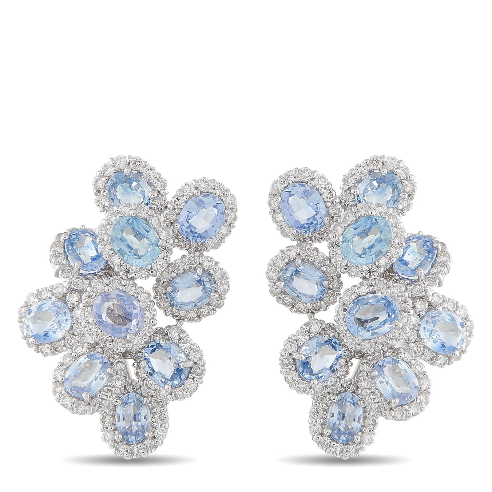 18K White Gold 3.0ct Diamond and Sapphire Clip-On Earrings: These luxury earrings will add a stylish pop of color to any ensemble. Elevated enough for even your most special occasions, Sapphires totaling 10.0 carats make them instantly eye-catching. Diamond ac