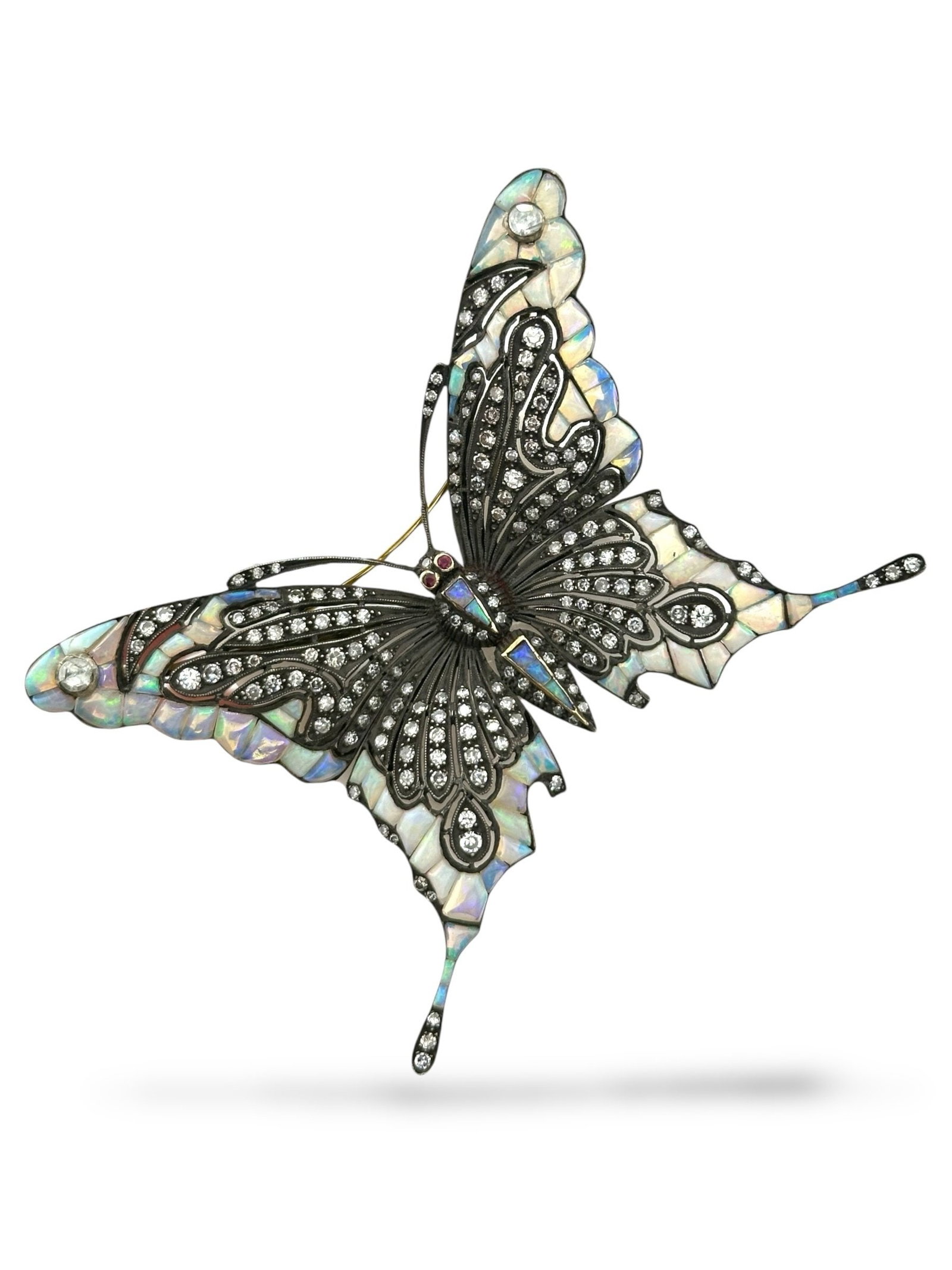 18K Yellow Gold Large Butterfly Brooch with Diamonds, Opals and Ruby Eyes Signed Art Deco: 18K Yellow Gold Butterfly Very Large Brooch with Diamonds, Opals and Ruby Eyes A finely crafted butterfly brooch in 18K yellow gold, featuring opal-inlaid wings accented with rubies for the eyes. The 