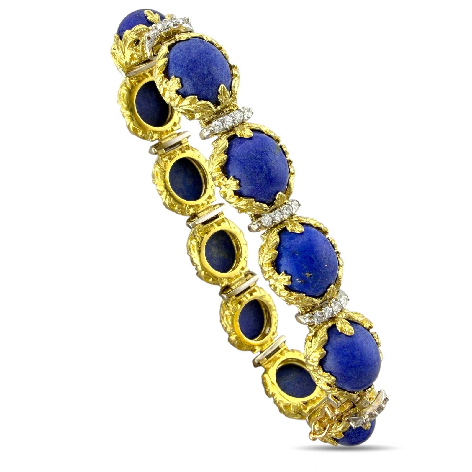 French 18K Yellow Gold Lapis Lazuli and 2.2ct Diamond Bracelet: French 18K Yellow Gold Lapis Lazuli and 2.2ct Diamond Bracelet This beautifully crafted bracelet features bold lapis stones set in warm yellow gold, giving the piece a rich, refined presence on the wr