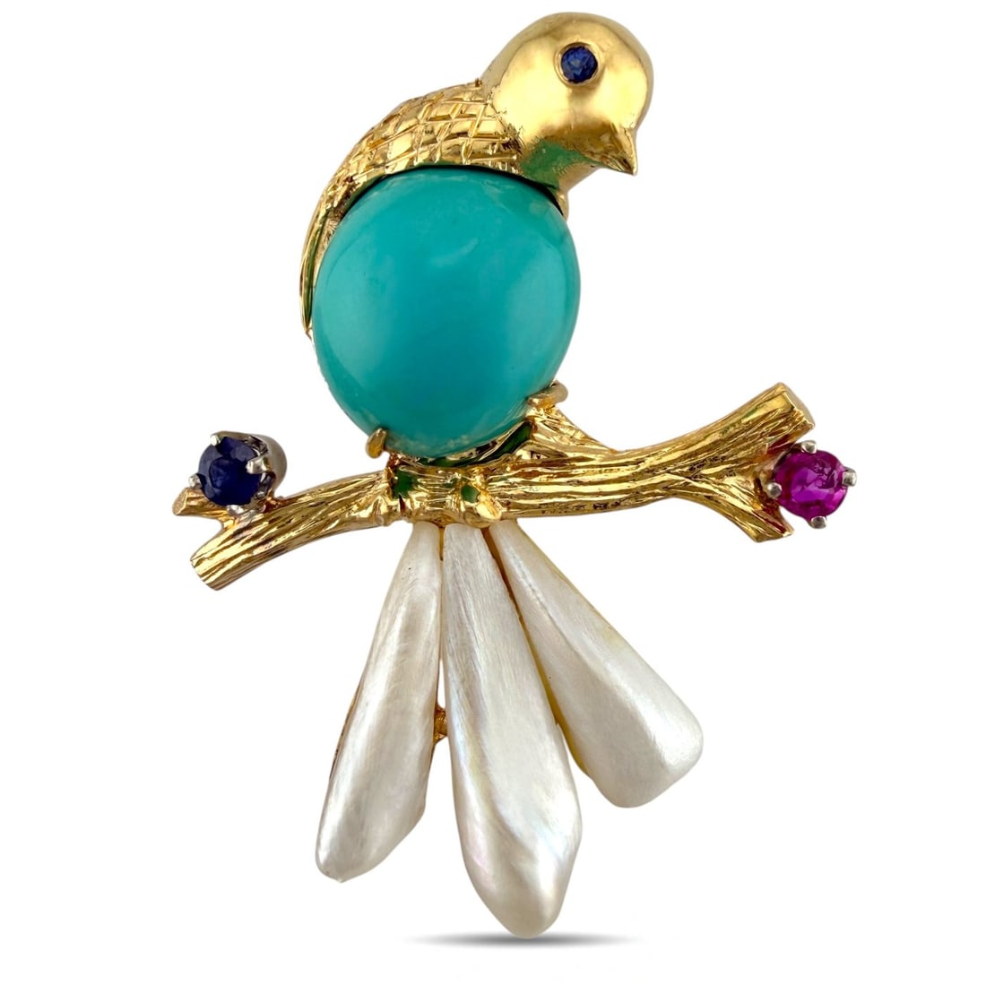 14K Yellow Gold Carved Mother of Pearl Bird Brooch: 14K Yellow Gold Bird Brooch This graceful brooch presents a beautifully carved mother of pearl bird perched on a slender branch, creating a gentle and poetic composition. The detailing of the feathers