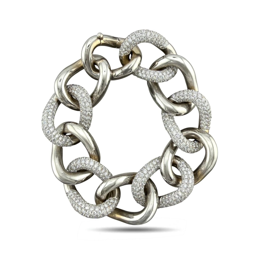 Tiffany & Co. White Gold 22.00ct Diamond Link Bangle Bracelet: Tiffany & Co. White Gold 22.00ct Diamond Link Bangle Bracelet A substantial Tiffany & Co. diamond link bangle bracelet crafted in white gold with a bold large link design. Each diamond set link is arr