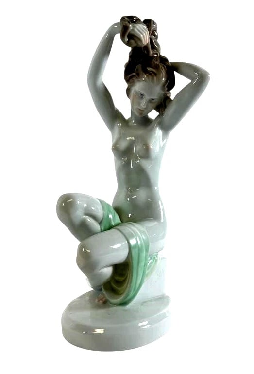 Vintage Herend Porcelain White Figurine Nude Lady Woman combing Hair: Vintage Herend Porcelain White Figurine Nude Lady Woman combing HairSigned Herend porcelain figurine titled Bathing Girl. Standing 14.75 inches tall, this delicately modeled piece features a seated nu