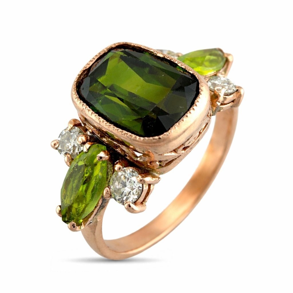 Imperial Russian 14K Rose Gold 2.15ct Peridot & 0.16ct Diamond Ring: Imperial Russian 14K Rose Gold 2.15ct Peridot & 0.16ct Diamond RingA refined Imperial Russian ring centered by a richly saturated cushion cut peridot, framed by delicate old world detailing in warm 14