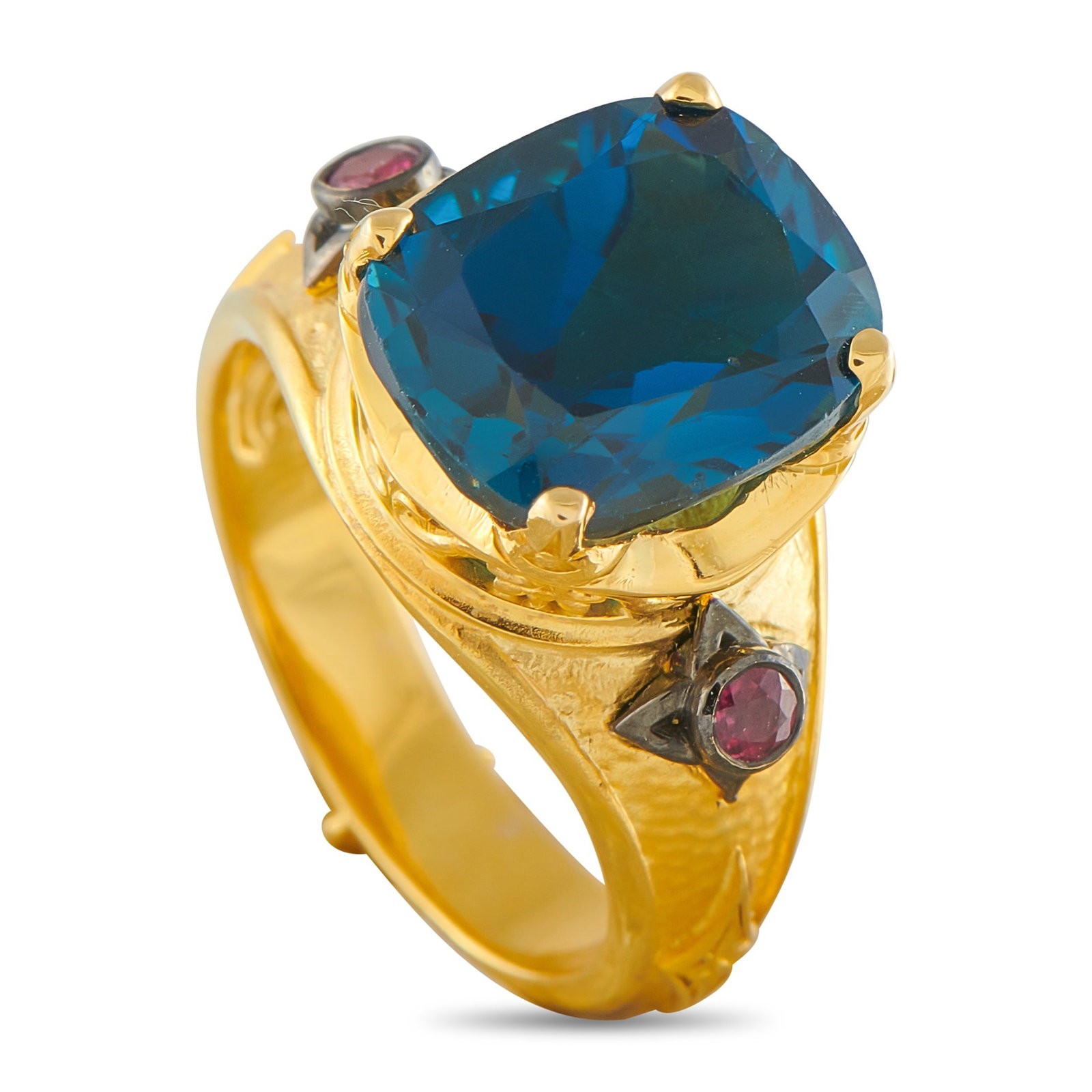 KONSTANTINO 18K Yellow Gold London Blue Topaz and Ruby Ring: A stunning London Blue Topaz makes a statement at the center of this stylish Konstantino ring. Accented by Ruby gemstones, the hammered 18K Yellow Gold setting further elevates this timeless design. I
