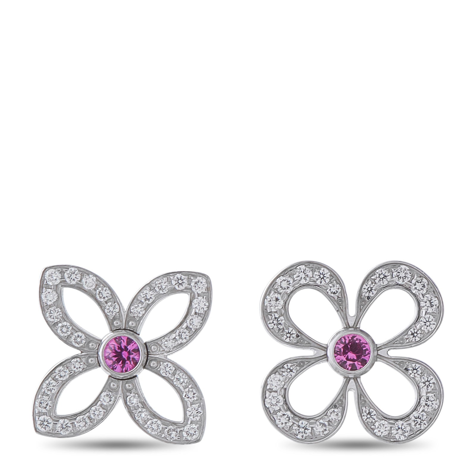 LOUIS VUITTON 18K White Gold Diamond and Sapphire Monogram Flower Earrings: These Louis Vuitton mismatched earrings feature a delicate reinterpretation of the luxury brand’s iconic monogram flowers. Set in 18K White Gold, Diamonds accent the petals while a singular