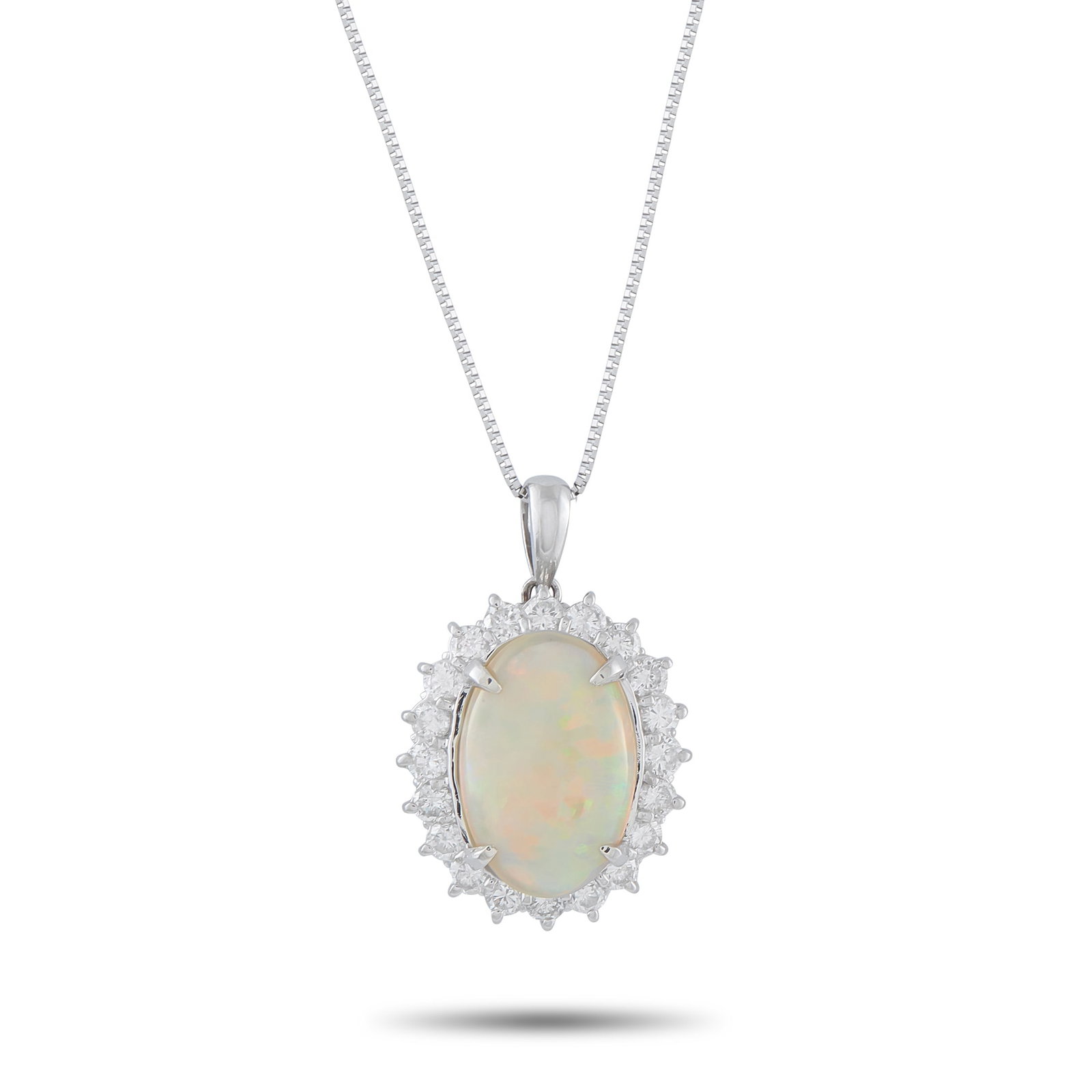 Platinum 1.10ct Diamond and Opal Pendant: A 4.17 carat Opal illuminates this exquisite necklace. Set in Platinum, a halo of Diamonds totaling 1.10 carats surround the center stone for even more sparkle. The pendant measures 1.0” long by