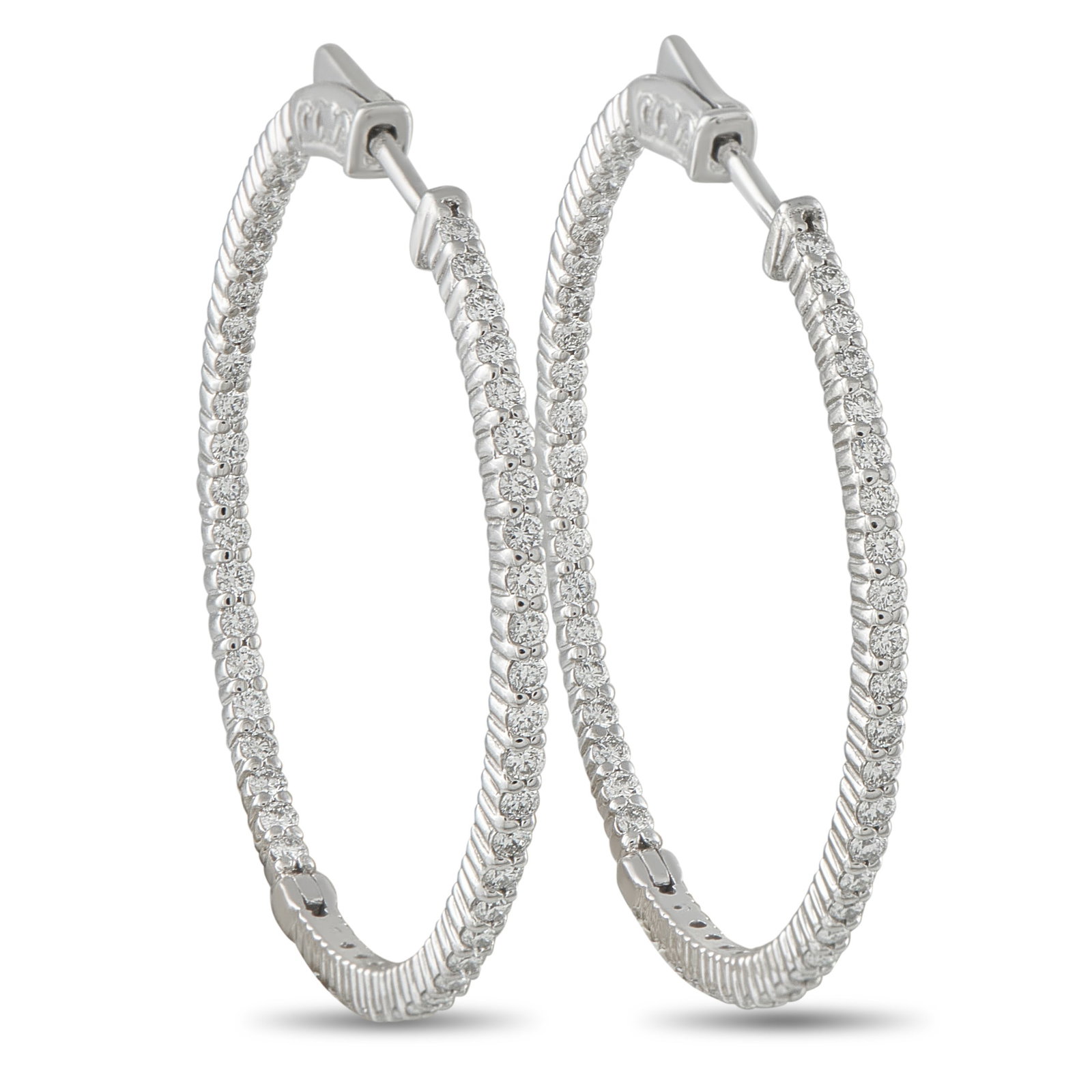 14K White Gold 2.0ct Diamond Inside-Out Hoop Earrings: No jewelry collection is complete without a classic pair of hoop earrings. Elegant and incredibly sophisticated, each earring is crafted from 14K White Gold and measures 1.50” round. Diamonds wi