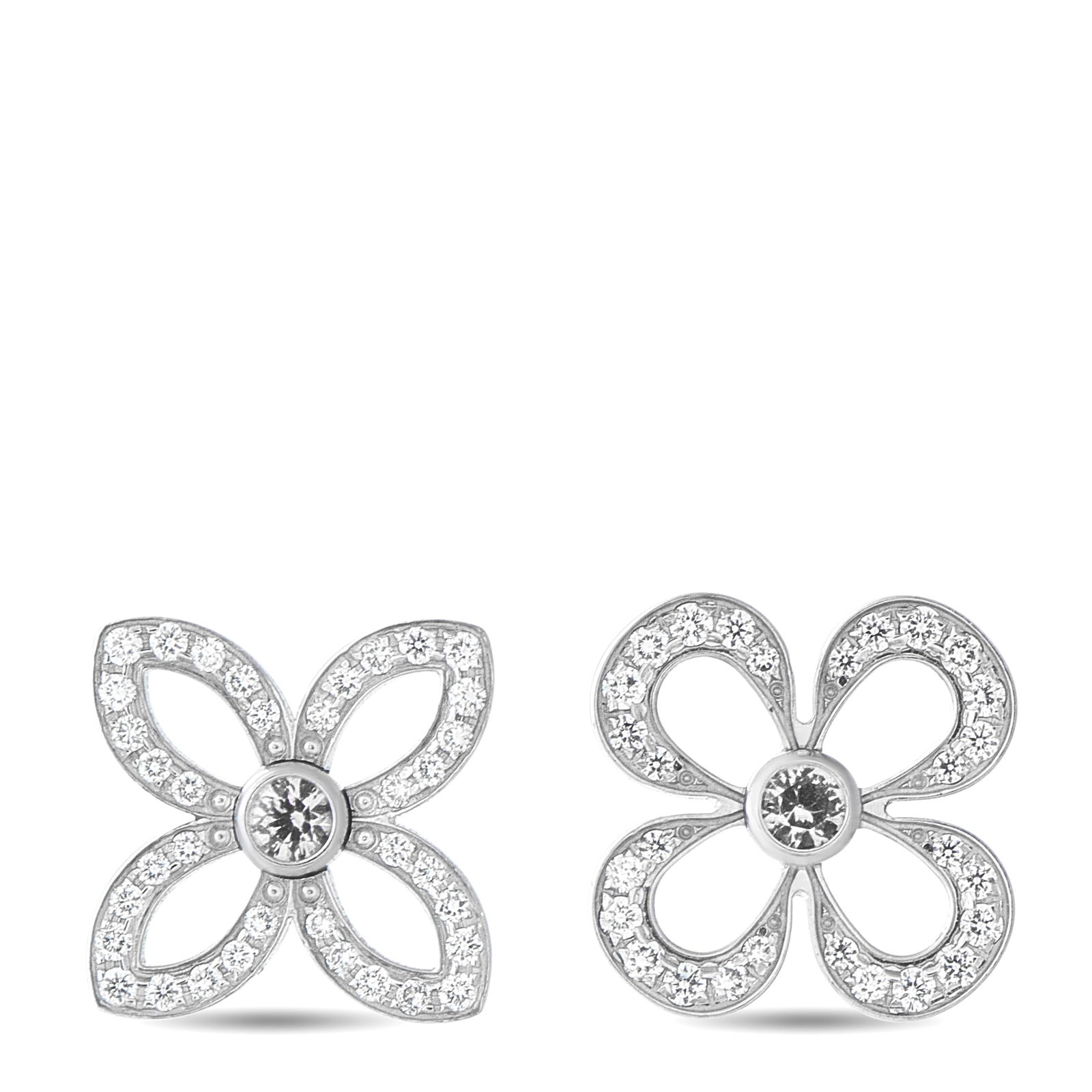 LOUIS VUITTON 18K White Gold Diamond Monogram Flower Earrings: A mismatched design makes these Louis Vuitton earrings even more charming. Set in 18K White Gold, they feature two of the brand’s iconic monogram flower motifs. Sparkling Diamonds add even more luxu