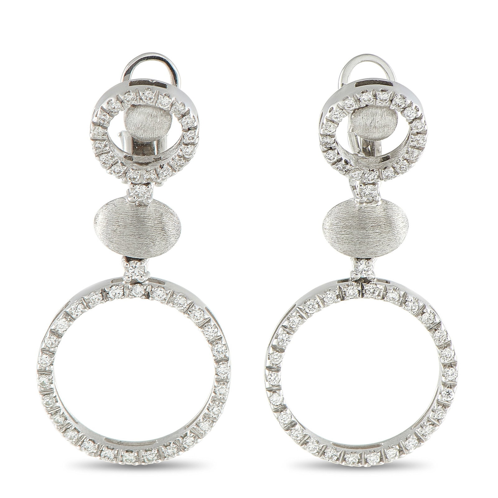 NANIS 18K White Gold 1.20ct Diamond Earrings: These Nanis earrings are designed to add sparkle to every movement. Diamonds with a total weight of 1.20 carats elevate the circular 18K White Gold settings. Each earring measures 1.50” long by 