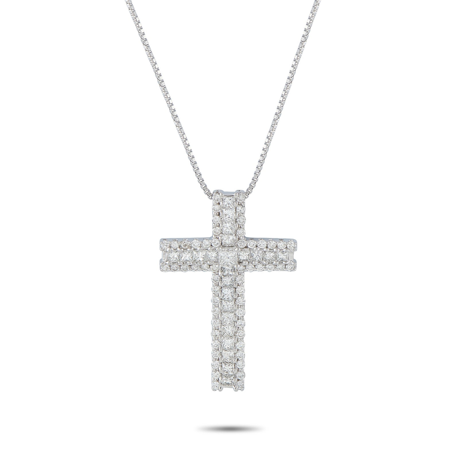 18K White Gold 1.75ct Diamond Cross Pendant: This necklace is a luxury piece that is meant to be passed through the generations. Set in 18K White Gold, the stunning cross pendant shines to life thanks to sparkling Diamonds totaling 1.75 carats. 