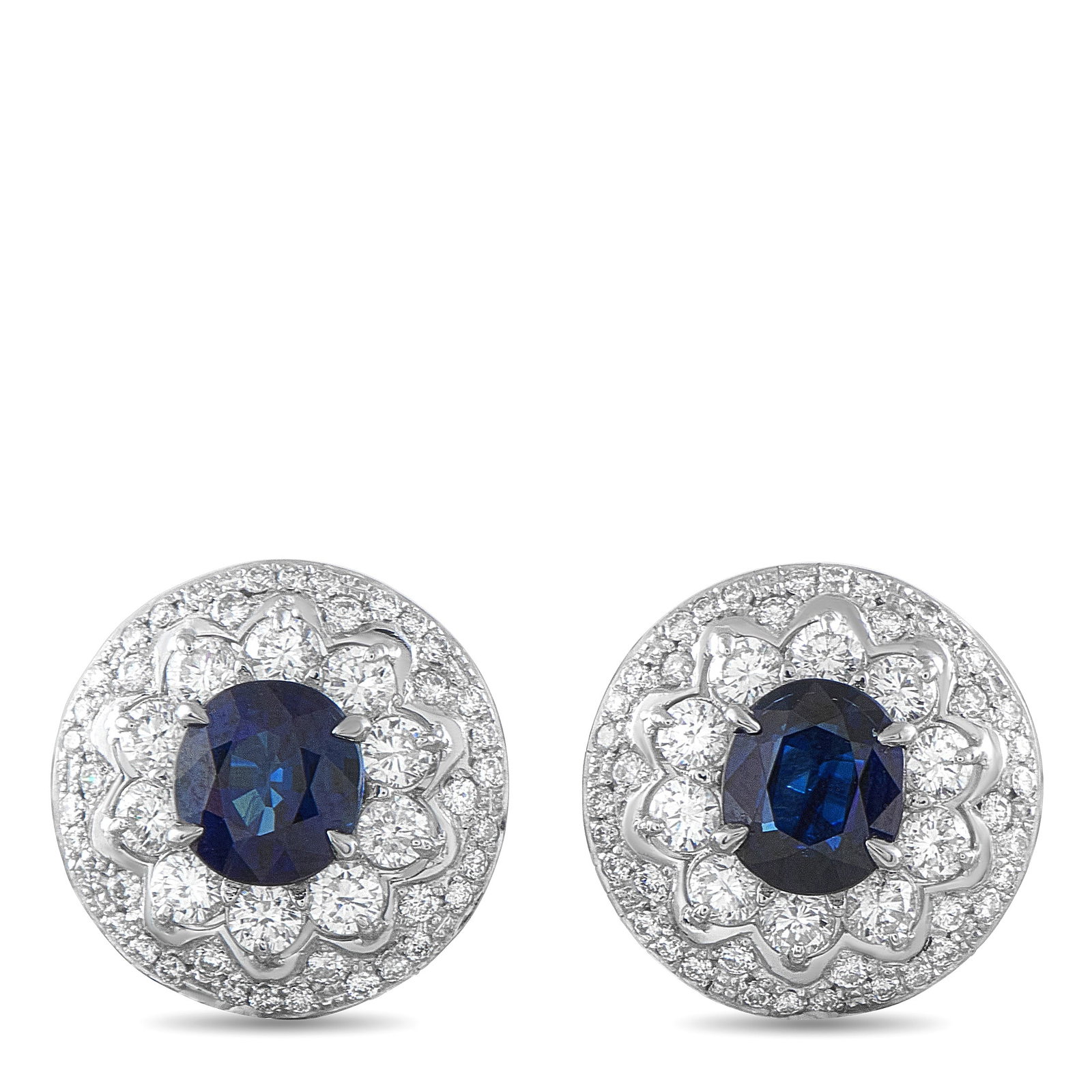 Platinum 1.32ct Diamond and Sapphire Earrings: Detailed Platinum settings provide the perfect foundation for these exquisite earrings. Sapphires with a total weight of 2.38 carats make a statement at the center, while Diamond accents totaling 1.32