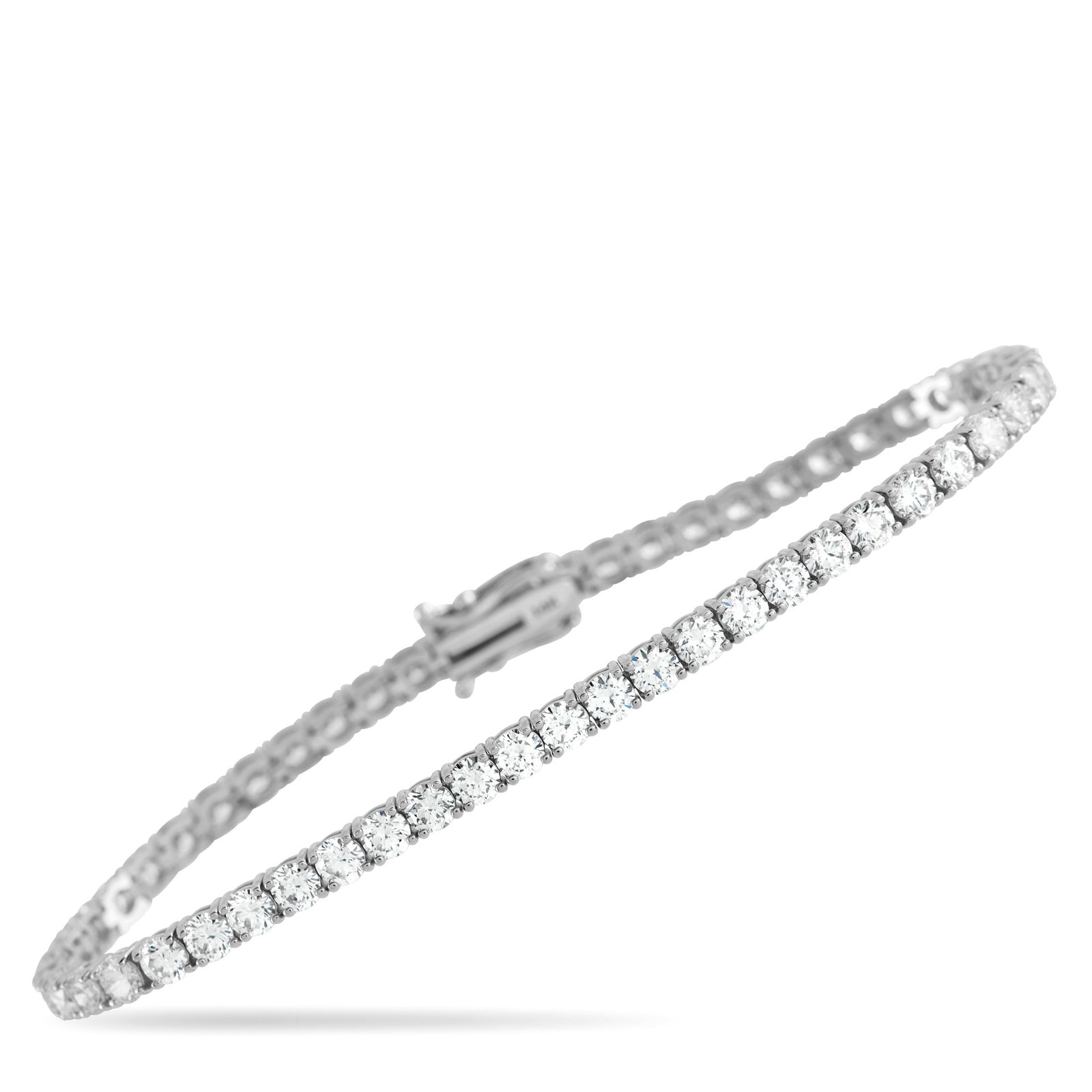 14K White Gold 6.50ct Lab-Grown Diamond Tennis Bracelet: This sparkling tennis bracelet is an instant classic. A series of Lab Grown Diamonds with a total weight of 6.50 carats make this the perfect way to add a touch of luxury to any ensemble. Set in 14K W