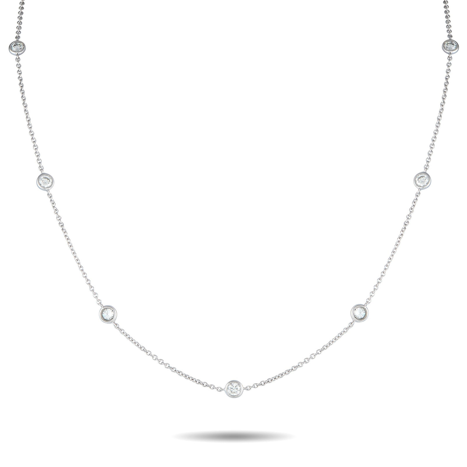 18K White Gold 1.75ct Diamond Station Necklace: Versatile and always in style, this Exclusive diamond station necklace is made to move with you. It fits in wherever the day takes you, from office hours to after-hours, with its tasteful design with 