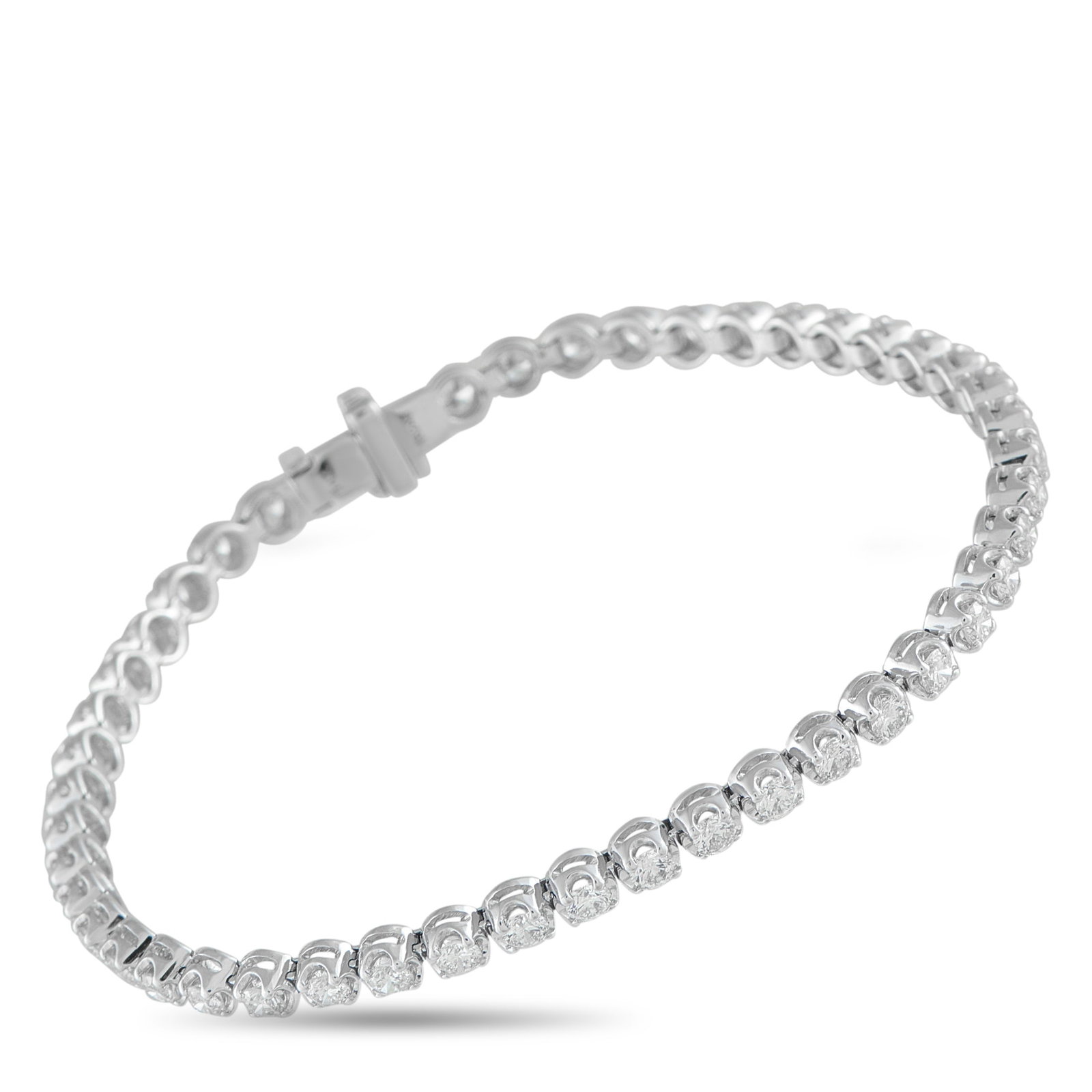 14K White Gold 3.20ct Diamond Bracelet: Crafted in 14K white gold, this Exclusive bracelet features a fluid line of 3.20 carats of diamonds for a look that’s polished and effortlessly wearable. The design keeps the sparkle controlled and 