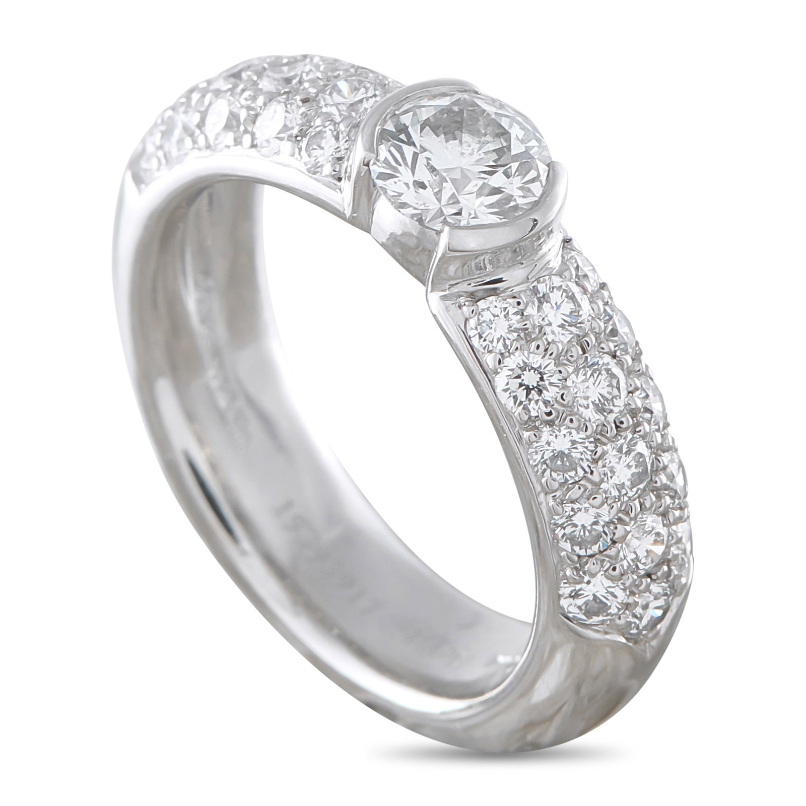 TIFFANY & CO. Tiffany & Co. Platinum 0.96ct Diamond Ring: This Tiffany & Co. ring is a piece that will continually impress. Set in Platinum, it features a 0.46 carat Diamond center stone and additional inset Diamonds totaling 0.50 carats. A 4mm wide band and