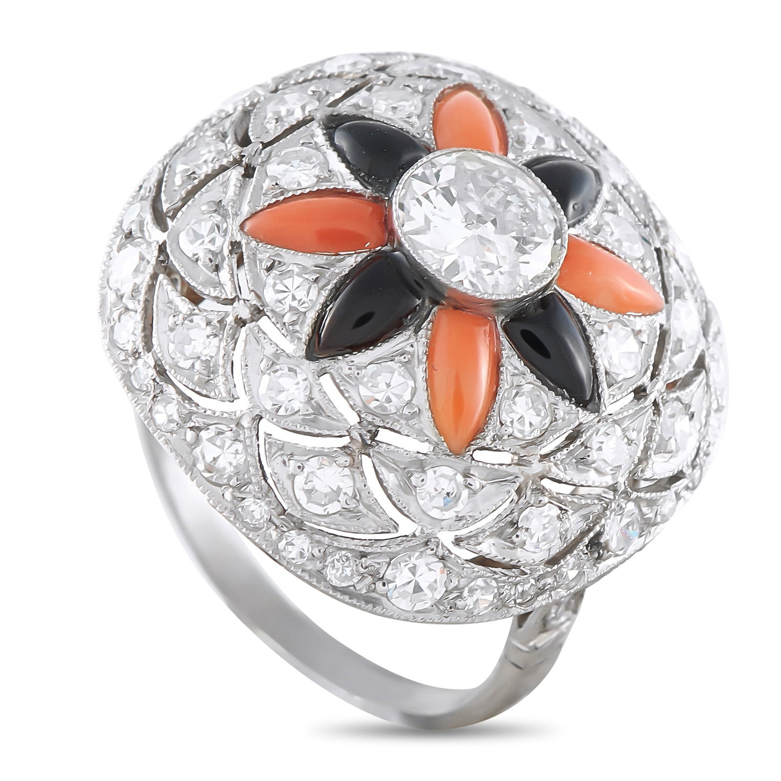 Platinum 1.50ct Diamond, Onyx and Coral Ring: Layered detail brings character to a compact dome. This platinum ring features a slim band that supports a raised cap, its surface built from a mosaic of diamonds set within fine milgrained frames. At
