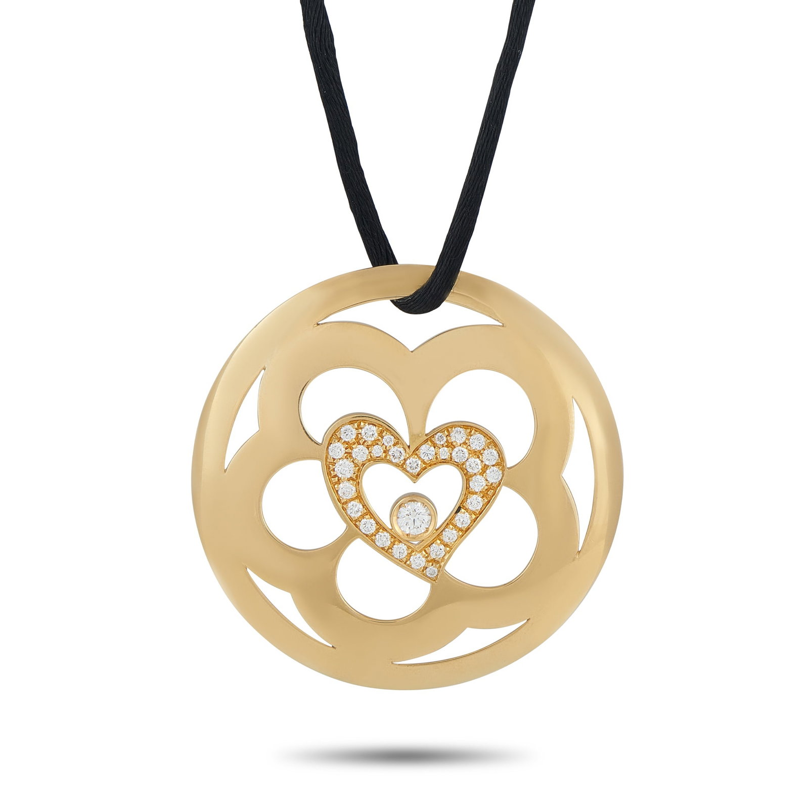 ESCADA 18K Yellow Gold 0.75ct Diamond Pendant: This striking Escada necklace is meant to make a statement. Negative space gives the 18K Yellow Gold pendant an artistic sensibility. At the center, a heart motif comes to life thanks to sparkling Dia