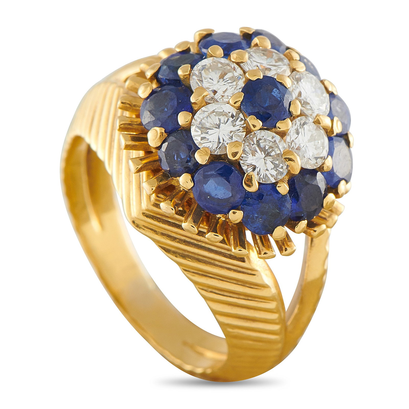 TIFFANY & CO. Tiffany & Co. Vintage 18K Yellow Gold 0.72ct Diamond and Sapphire Ring: This vintage Tiffany & Co. ring is incredibly opulent. Diamonds with a total weight of 0.72 carats and Sapphires totaling 1.0 carats come together in perfect harmony at the top of this piece’s textu