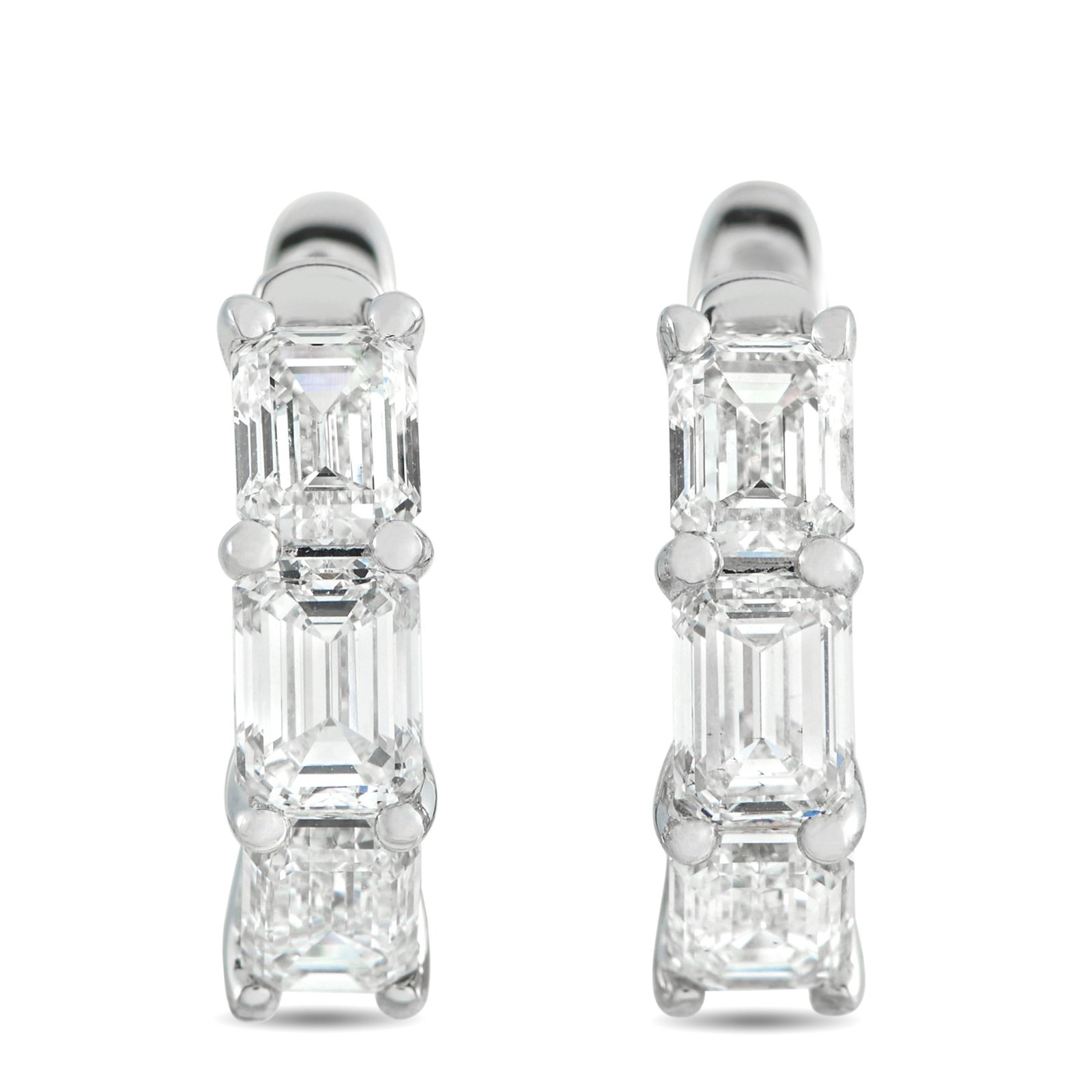 18K White Gold 2.85ct Diamond Earrings: These luxury earrings are designed to effortlessly catch the light. Emerald cut Diamonds with a total weight of 2.85 carats make a statement on this elegant, understated accessory. Crafted from 18K Wh