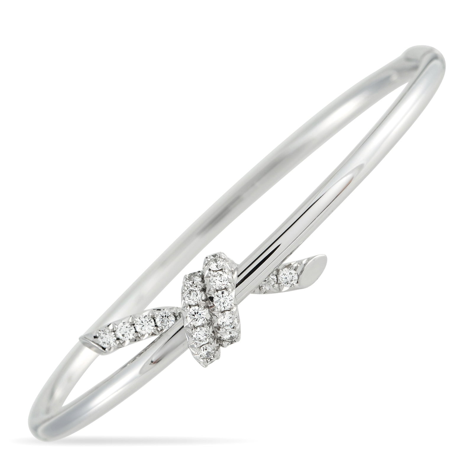 TIFFANY & CO. Tiffany & Co. Knot 18K White Gold 0.79ct Diamond Bangle: Simple and perfectly understated, this Tiffany & Co. knot bangle is meant to symbolize life’s most meaningful connections. Crafted from polished 18K White Gold, sparkling Diamonds with a total weigh