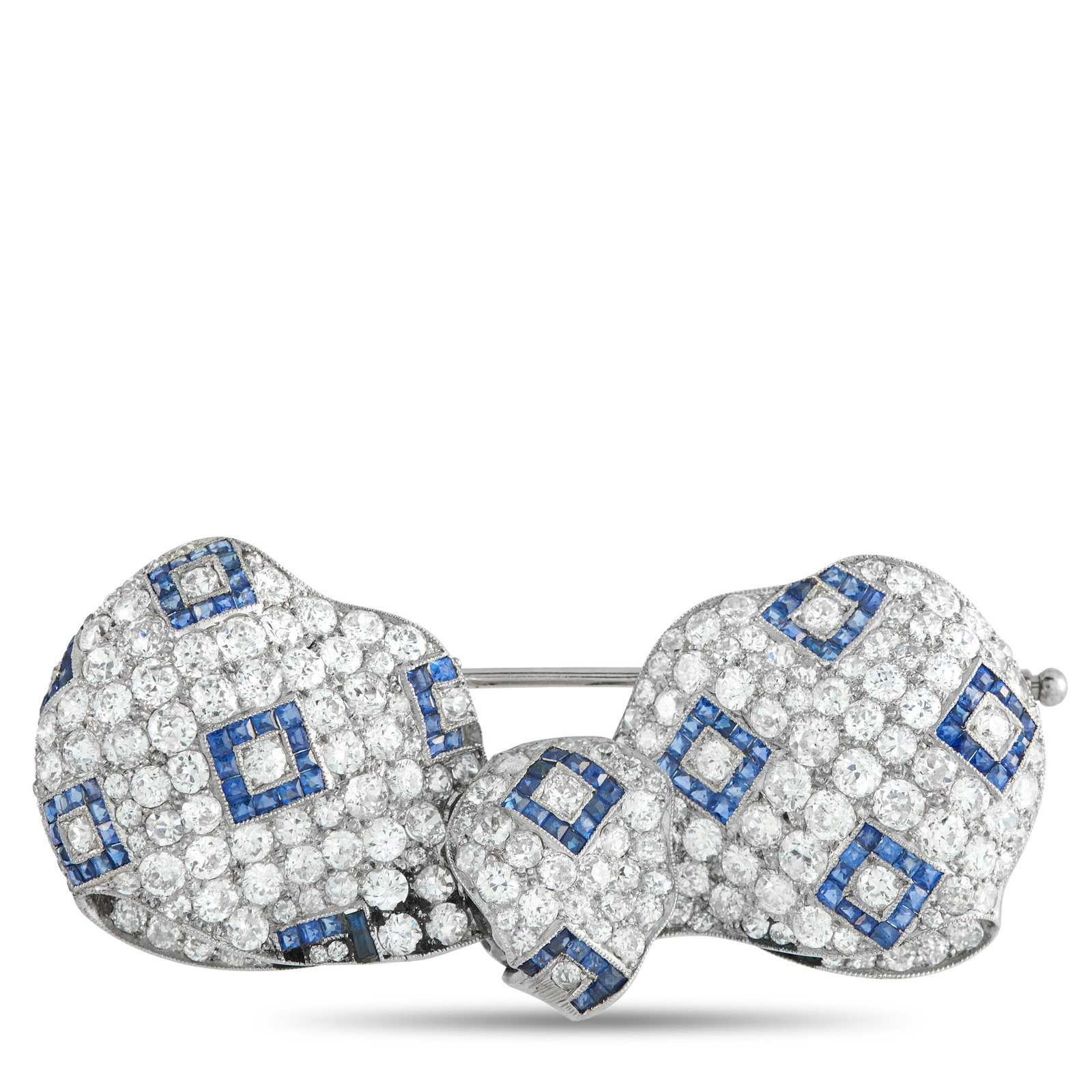 18K Yellow Gold and Platinum 5.0ct Diamond and Sapphire Art Deco Brooch: This Art Deco bow brooch is a fine example of high-jewelry artistry. A mosaic of brilliant diamonds encrusts the entire surface, while sapphires arranged in concentric diamond shapes provide a strikin