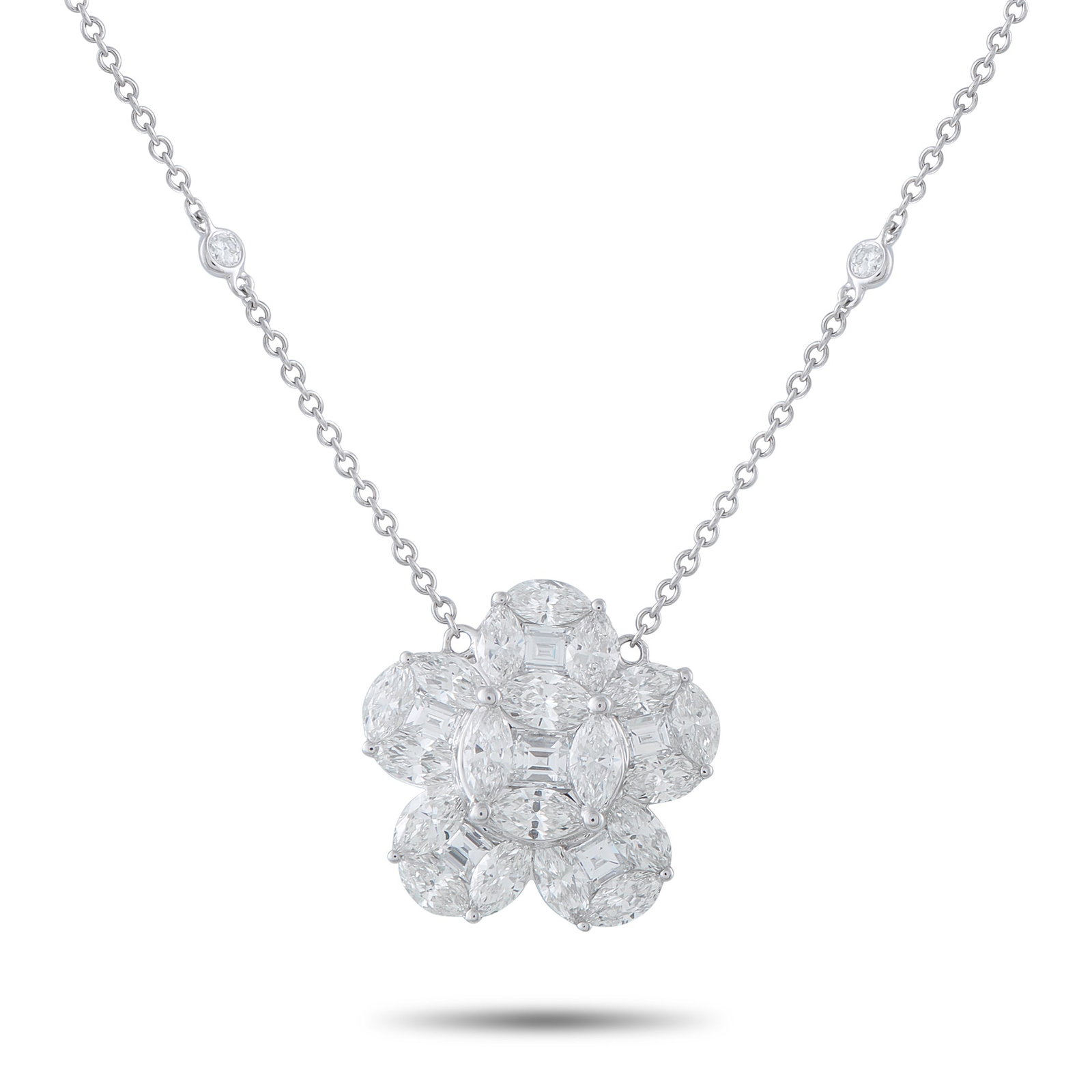 18K White Gold 4.75ct Diamond Necklace: A floral pendant covered in sparkling Diamonds totaling 4.75 carats makes this charming necklace a luxurious addition to any ensemble. Crafted from 18K White Gold, the pendant measures 0.75” rou