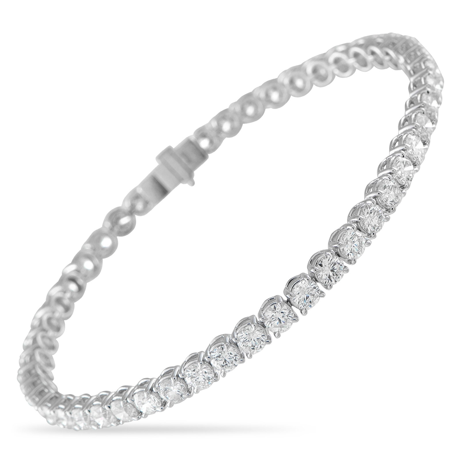 18K White Gold 8.0ct Diamond Tennis Bracelet: Sparkling Diamonds with a total weight of 8.0 carats make this classic tennis bracelet endlessly impressive. Sleek and elegant, it’s crafted from 18K White Gold and will effortlessly complement any