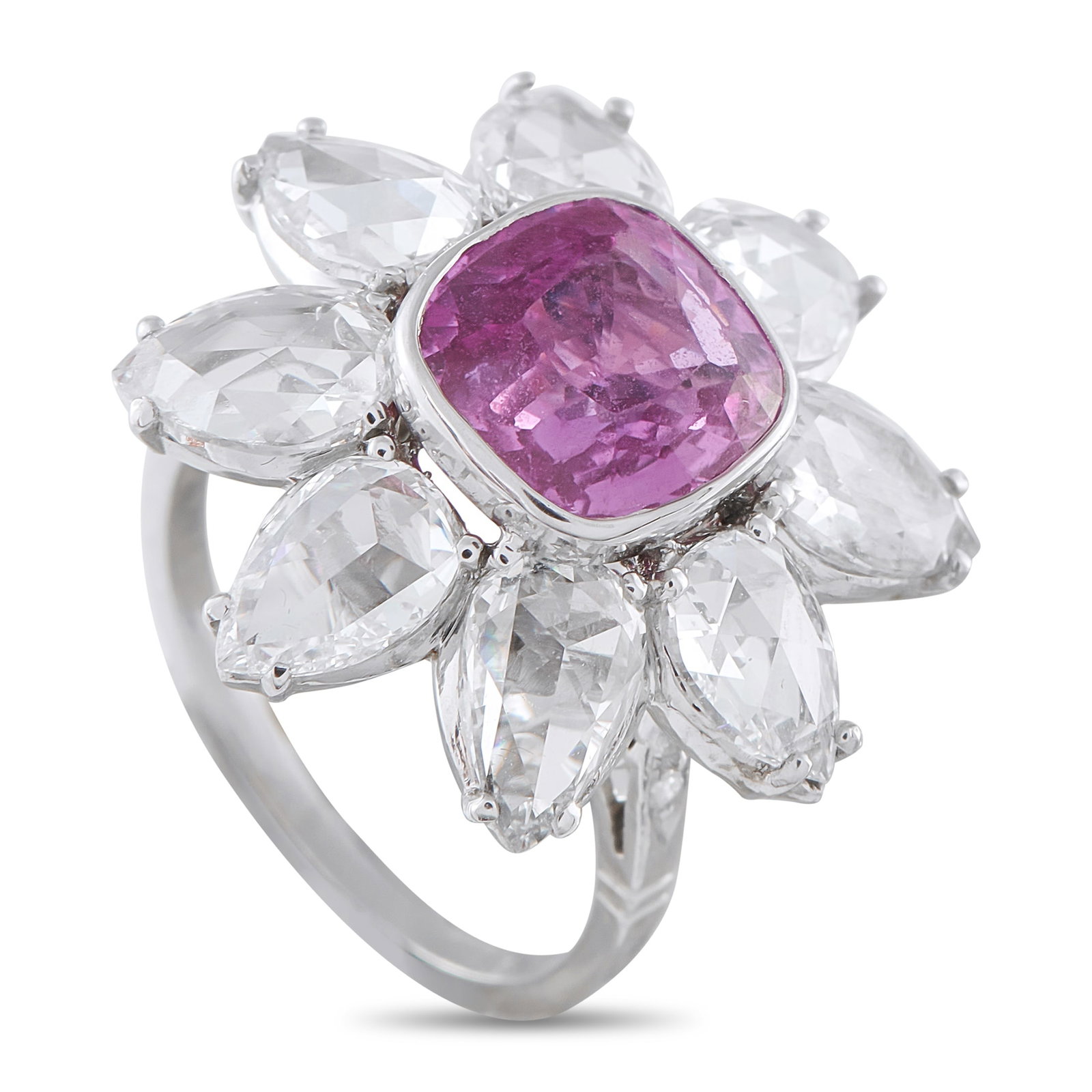 Platinum 3.85ct Diamond and Sapphire Flower Ring: In this Exclusive ring, a narrow line gives way to a full bloom. The 1mm platinum shank rises into a flower head where a 3.97-carat cushion pink-purple sapphire sits in a bezel. Eight pear-shaped diam