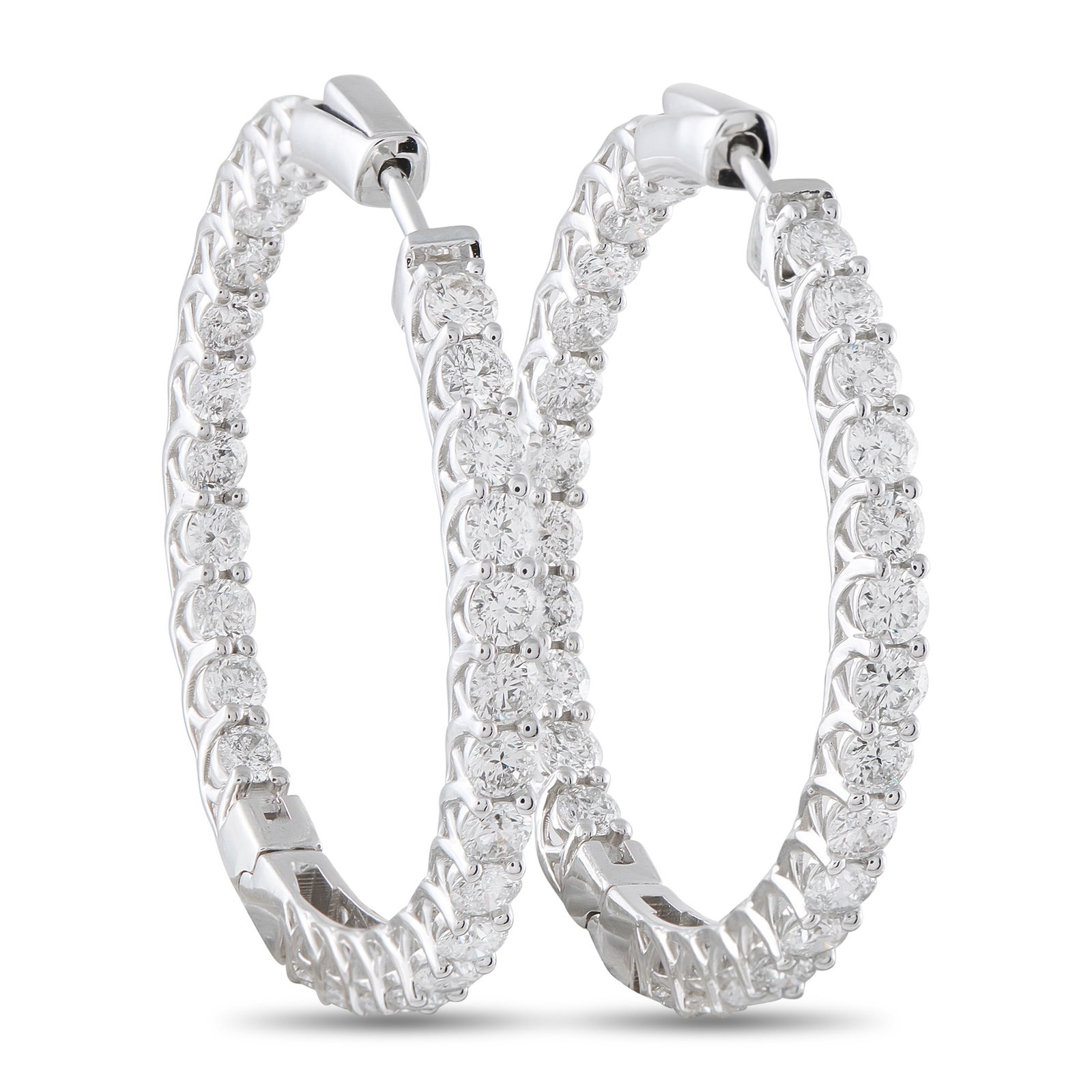 14K White Gold 10.20ct Diamond Inside-Out Hoop Earrings: These luxury hoop earrings will add sparkle to every movement. Crafted from 14K White Gold, Diamonds with a total weight of 10.20 carats cover both the inside and outside of the simple settings. Ideal