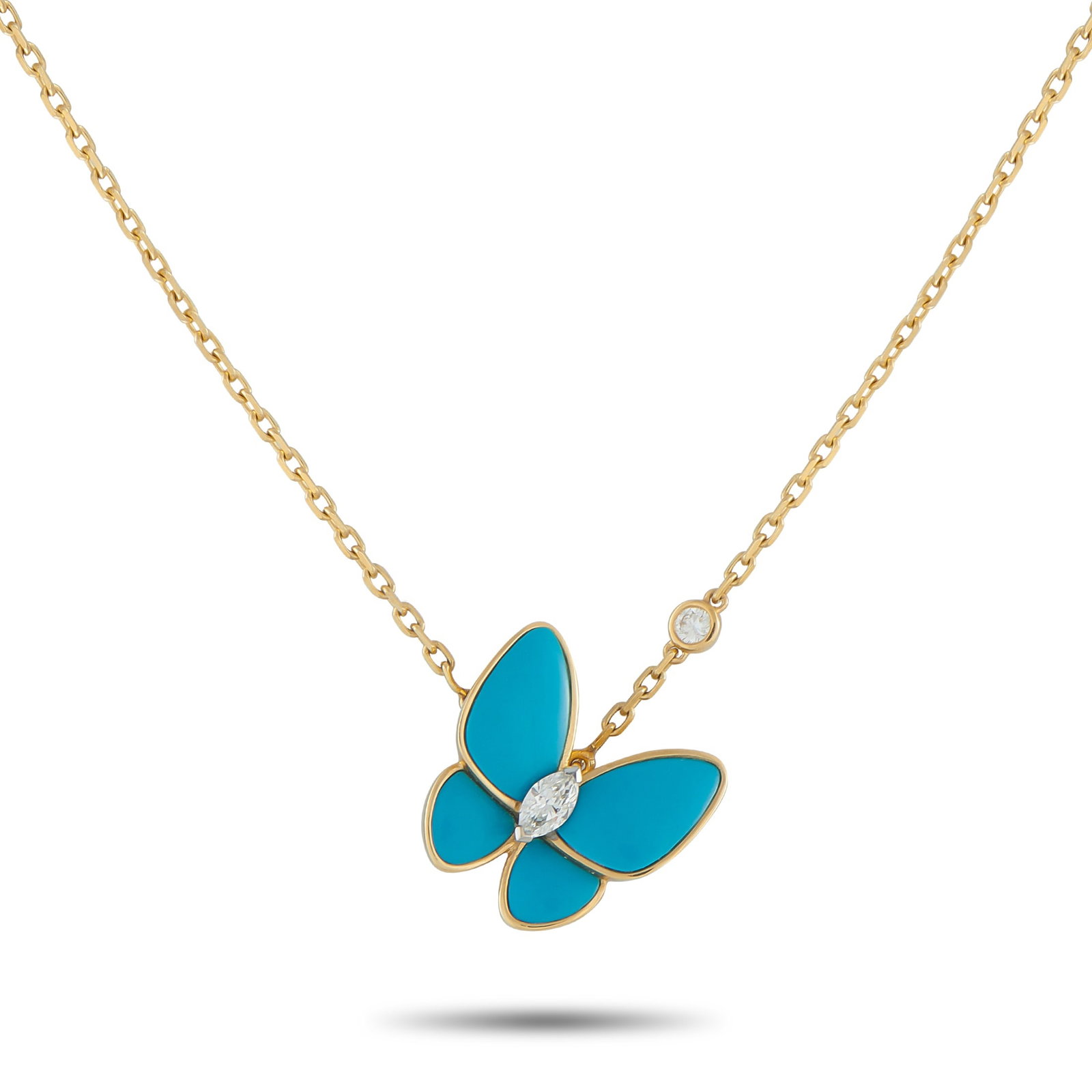 VAN CLEEF & ARPELS Van Cleef & Arpels 18K Yellow Gold Diamond and Turquoise Butterfly Necklace: This Van Cleef & Arpels necklace is sweet, stunning, and sophisticated. At the center of a 16” chain, a butterfly pendant makes a stylish statement thanks to Turquoise wings and a marquise-cut D