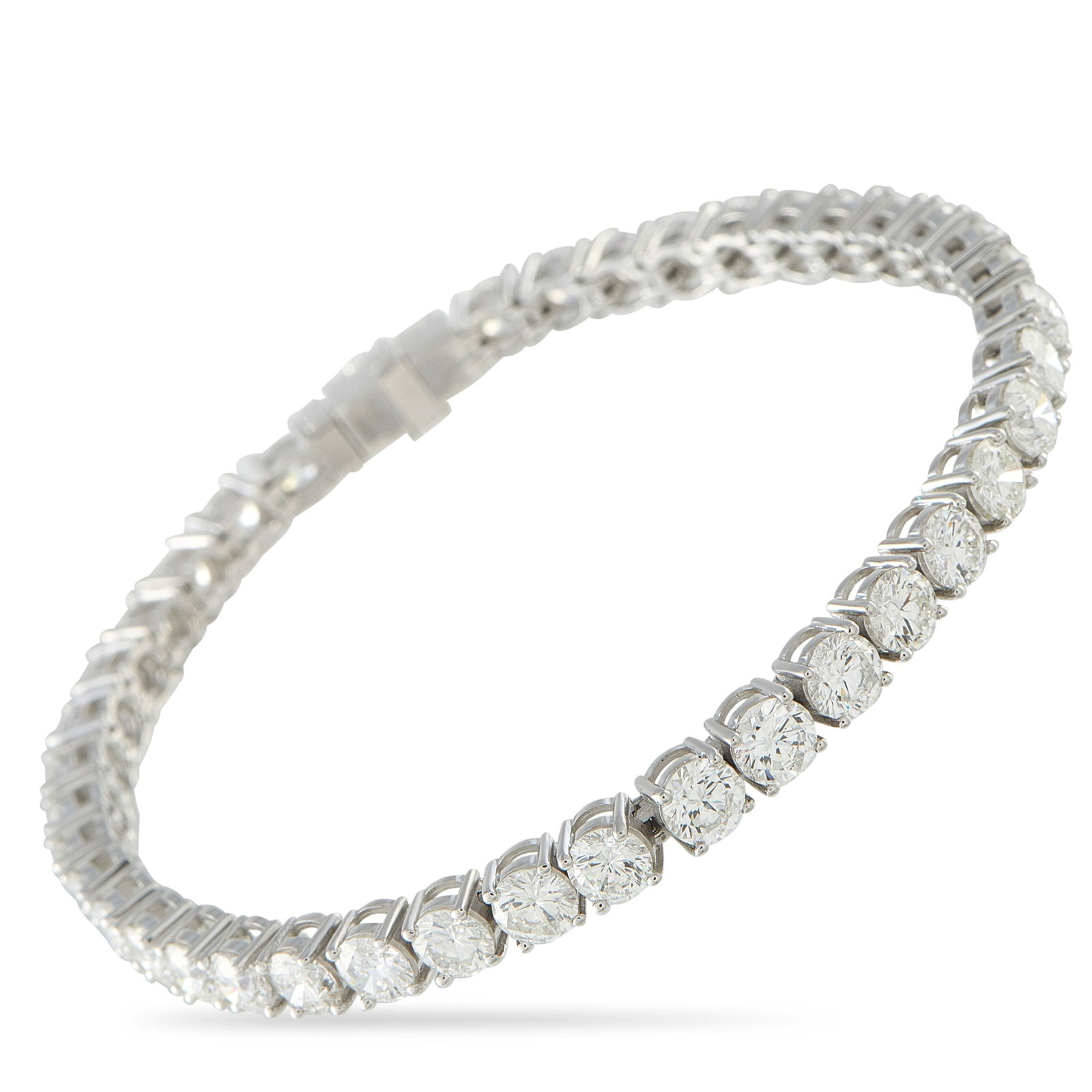 Platinum 11.57ct Diamond Tennis Bracelet: Sparkling Diamonds totaling 11.57 carats allow this luxury tennis bracelet to effortlessly catch the light. A dazzling piece that will complement any ensemble, it’s set in Platinum and measures 7.0&