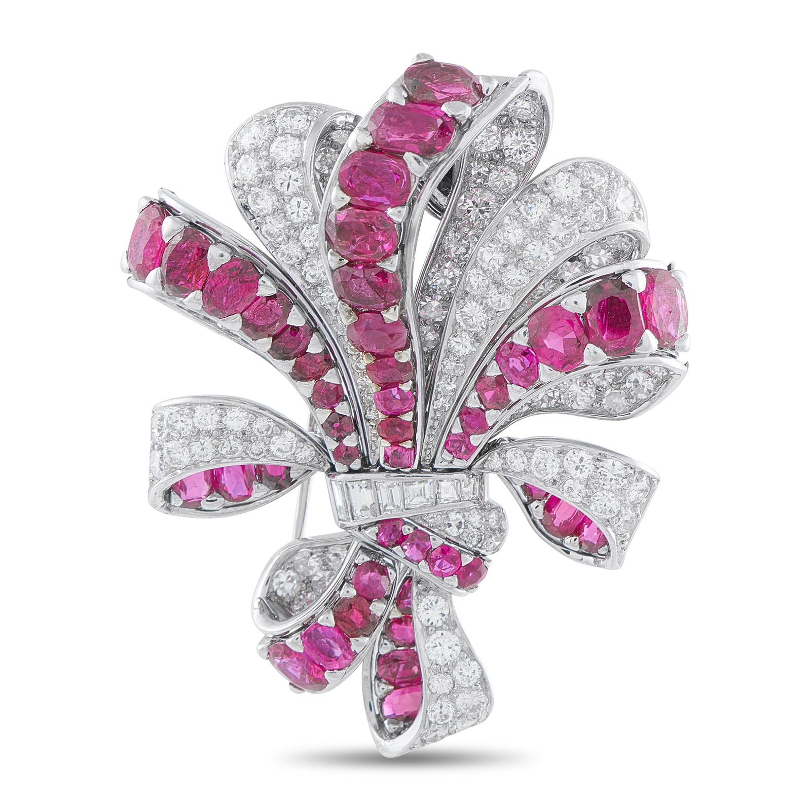 Platinum 6.25ct Diamond and Ruby Brooch: This luxury brooch will shine brightly every time it catches the light. Opulent and incredibly detailed, the Platinum setting offers a unique sense old fashioned elegance. Diamonds with a total weight