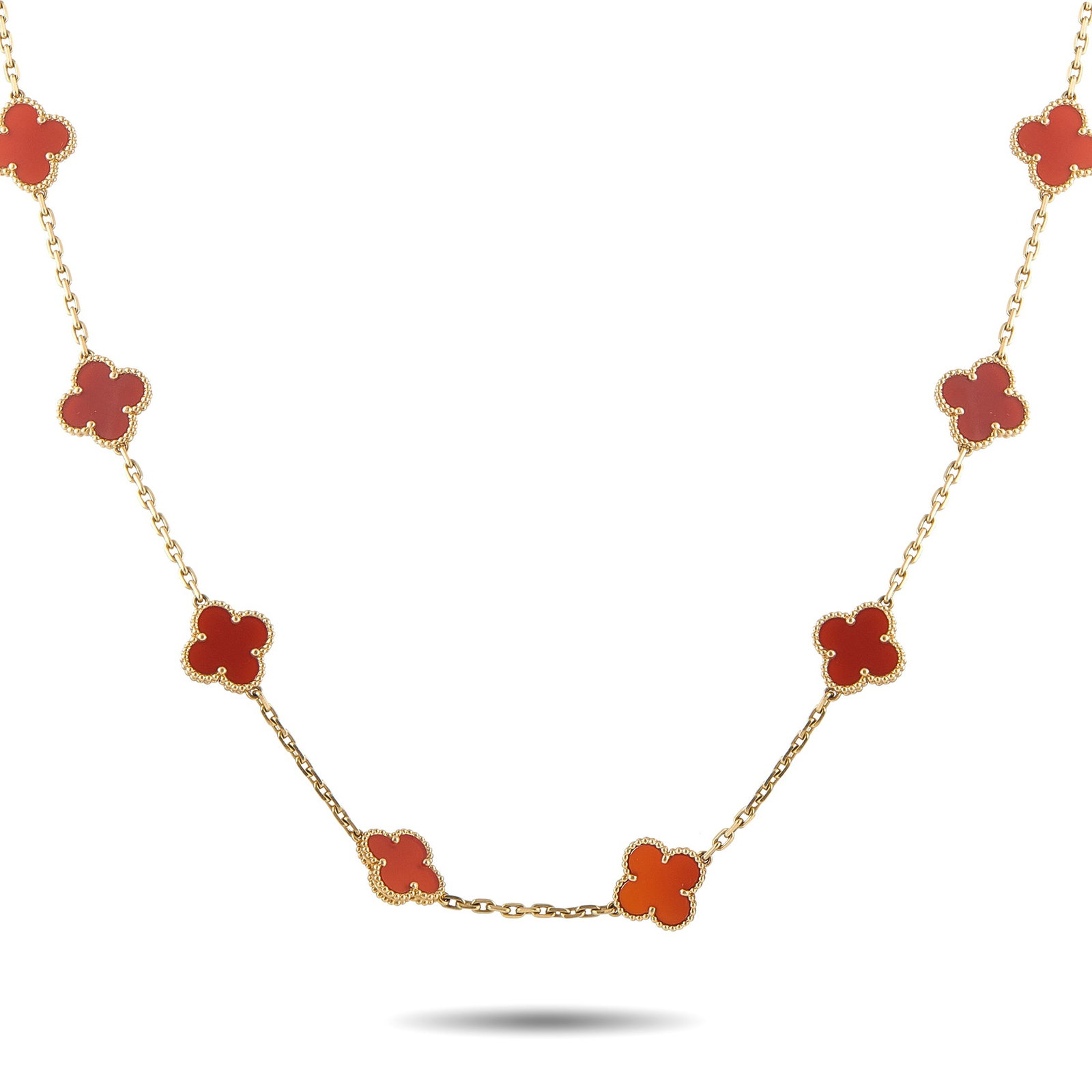 VAN CLEEF & ARPELS Van Cleef & Arpels Alhambra 18K Yellow Gold Carnelian 20-Motif Long Necklace: One of Van Cleef & Arpels’ most enduring designs, this 20-motif Vintage Alhambra necklace clearly carries the house’s language of luck, craftsmanship, and quiet elegance. Crafted in yellow gold, i