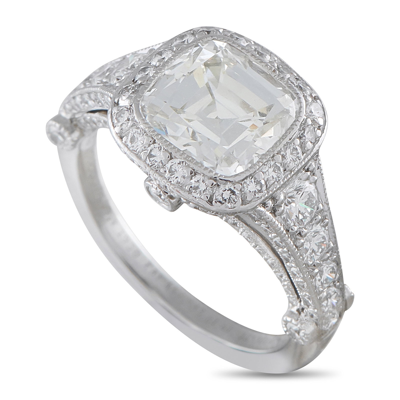 TIFFANY & CO. Tiffany & Co. Legacy Platinum 2.56ct Diamond Ring: Inspired by intricate pieces from the Edwardian era, this Tiffany & Co. Legacy ring exudes old fashioned elegance. A detailed Platinum setting beautifully showcases the 1.82 carat Diamond center stone
