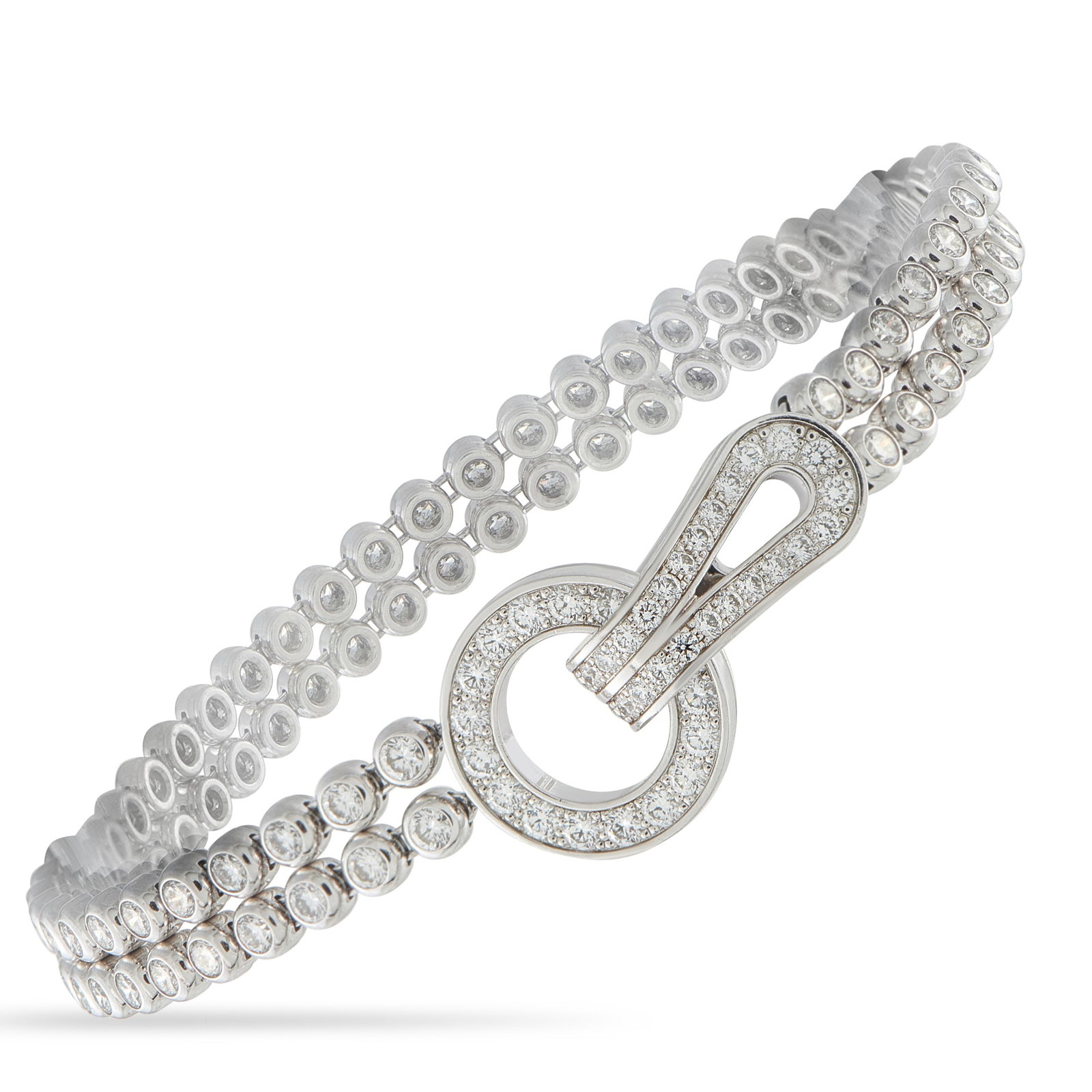 CARTIER Agrafe 18K White Gold 4.33ct Diamond Bracelet: Inspired by details found on high-end couture, this Cartier Agrafe bracelet is an upscale piece that will complement any luxury jewelry collection. At the center of the bezel-set Diamond chain, you’