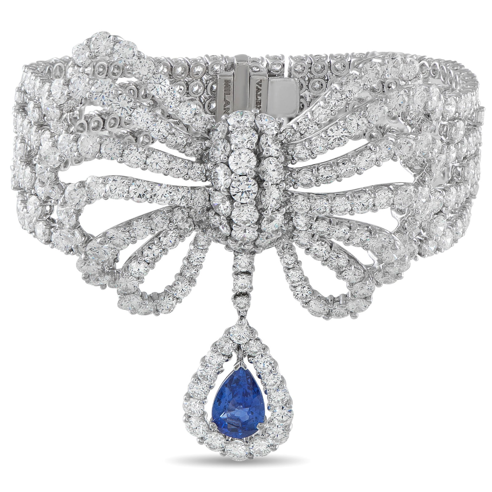 VALENTE MILANO 18K White Gold 36.53ct Diamond and Sapphire Bracelet: Diamonds with a total weight of 36.53 carats make this Valente Milano bracelet simply stunning. Set in 18K White Gold, the feminine design is further elevated by a dangling pendant accented by a 2.70 