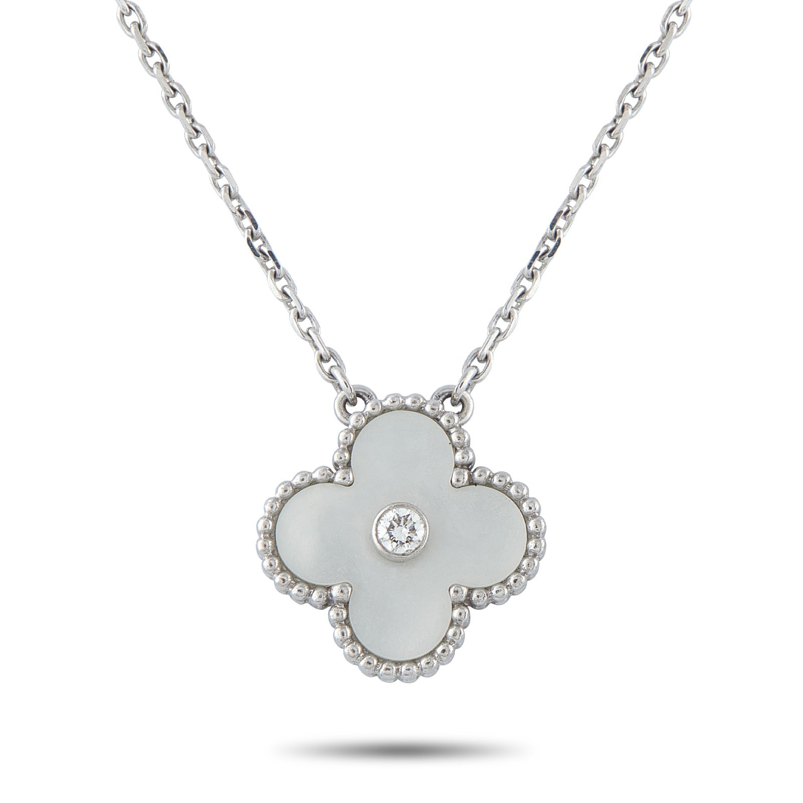 Van Cleef & Arpels Holiday Alhambra 18K White Gold Diamond and Mother of Pearl Pendant: Produced in limited quantities exclusively for the festive season, the Holiday Alhambra collection has long held a special place among Van Cleef & Arpels collectors. This 2009 edition marked a notable