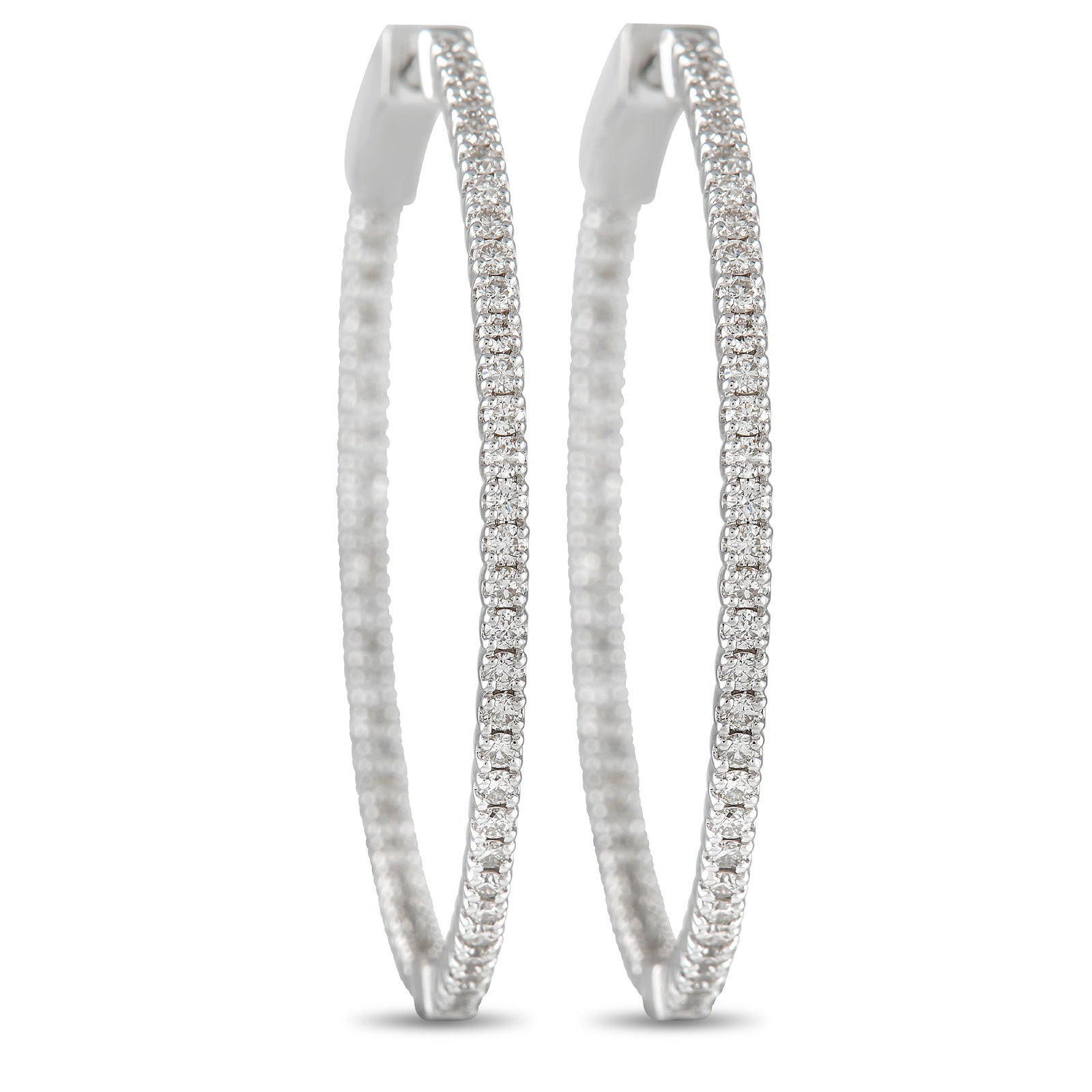 14K White Gold 1.34ct Diamond Inside-Out Hoop Earrings: No luxury jewelry collection is complete without a pair of diamond hoop earrings. Each one of these exquisite earrings features a shimmering 14K White Gold setting that measures 1.5” round. Diam