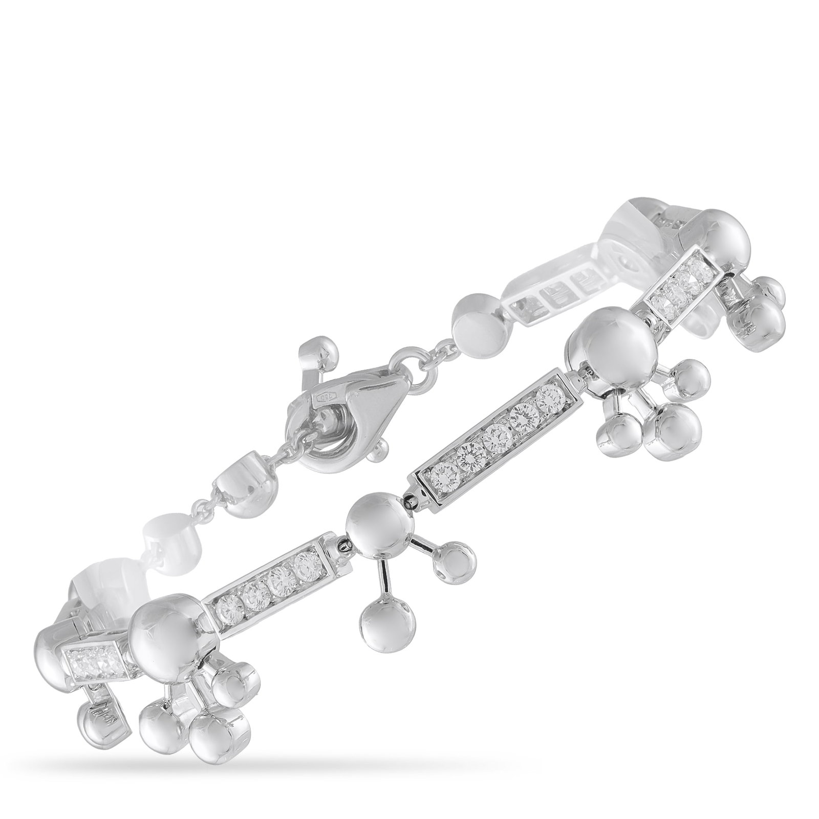 Bvlgari Astrale 18K White Gold 1.45ct Diamond Bracelet: With motifs that evoke constellations, this Bvlgari Astrale bracelet is a wearable work of art. This sleek, sophisticated design includes sparkling Diamonds with a total weight of 1.45 carats, which e