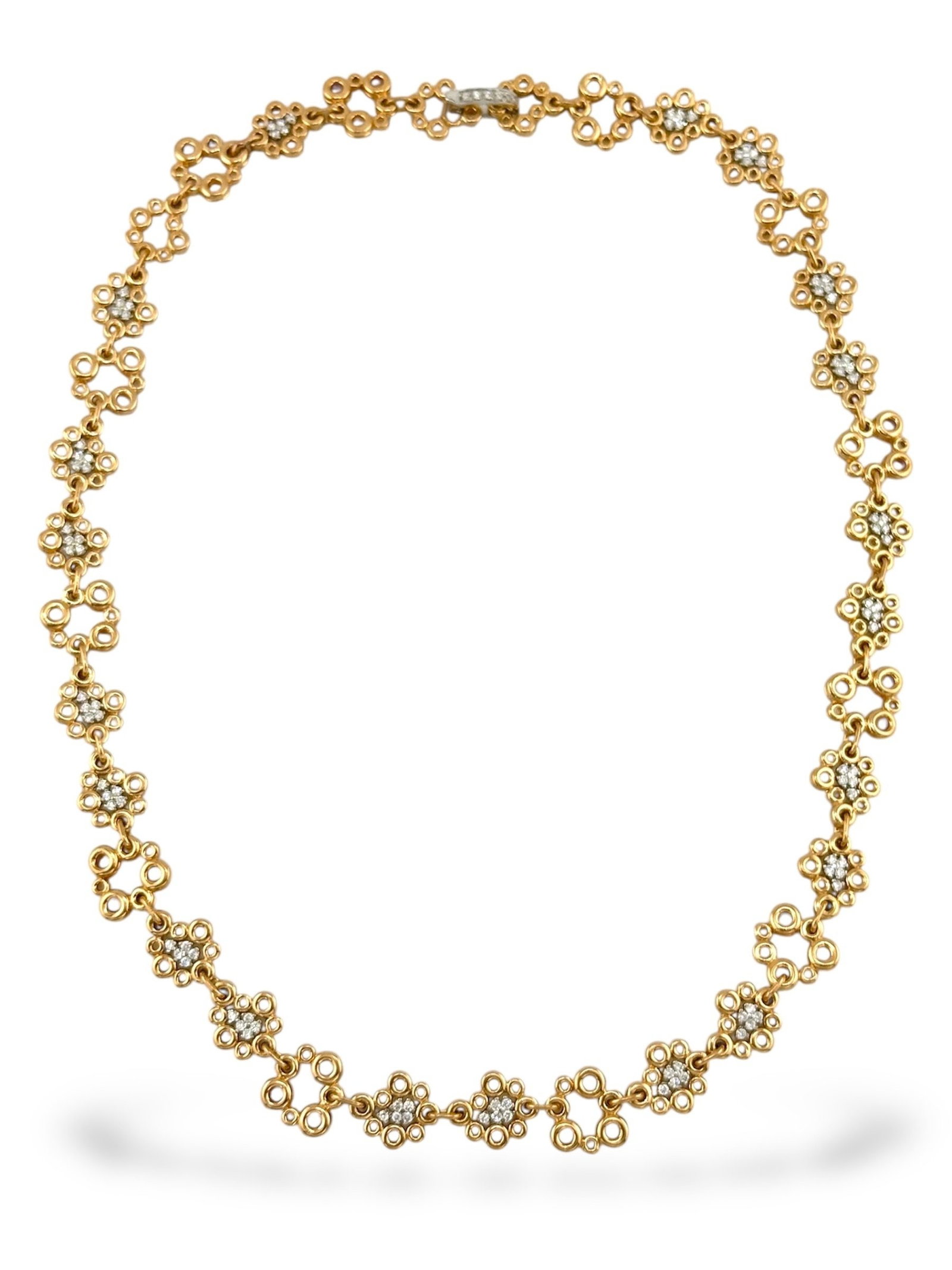 18K Rose Gold Bubble Motif Necklace with 1.1ct of Diamonds: 18K Rose Gold Bubble Motif Necklace with 1.1 Carats of Diamonds Crafted entirely in rich 18K rose gold, this elegant necklace showcases a distinctive bubble motif made up of smooth, rounded circular f