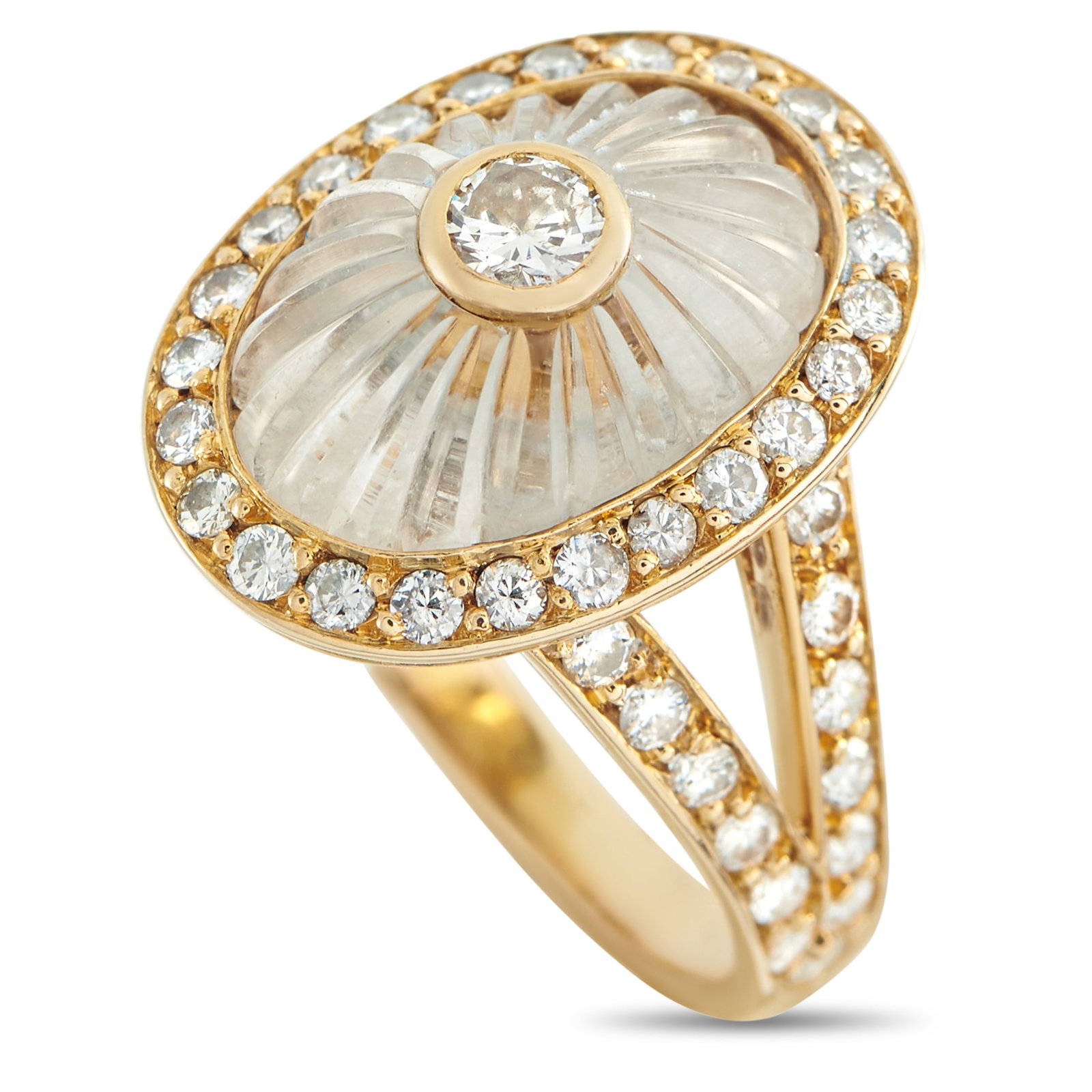 Boucheron 18K Yellow Gold 0.65ct Diamond and Rock Crystal Ring: Intricate details make this Boucheron ring a work of art. A carved Rock Crystal center stone adds texture and dimension to the 18K Yellow Gold setting. Diamonds with a total weight of 0.65 carats furt