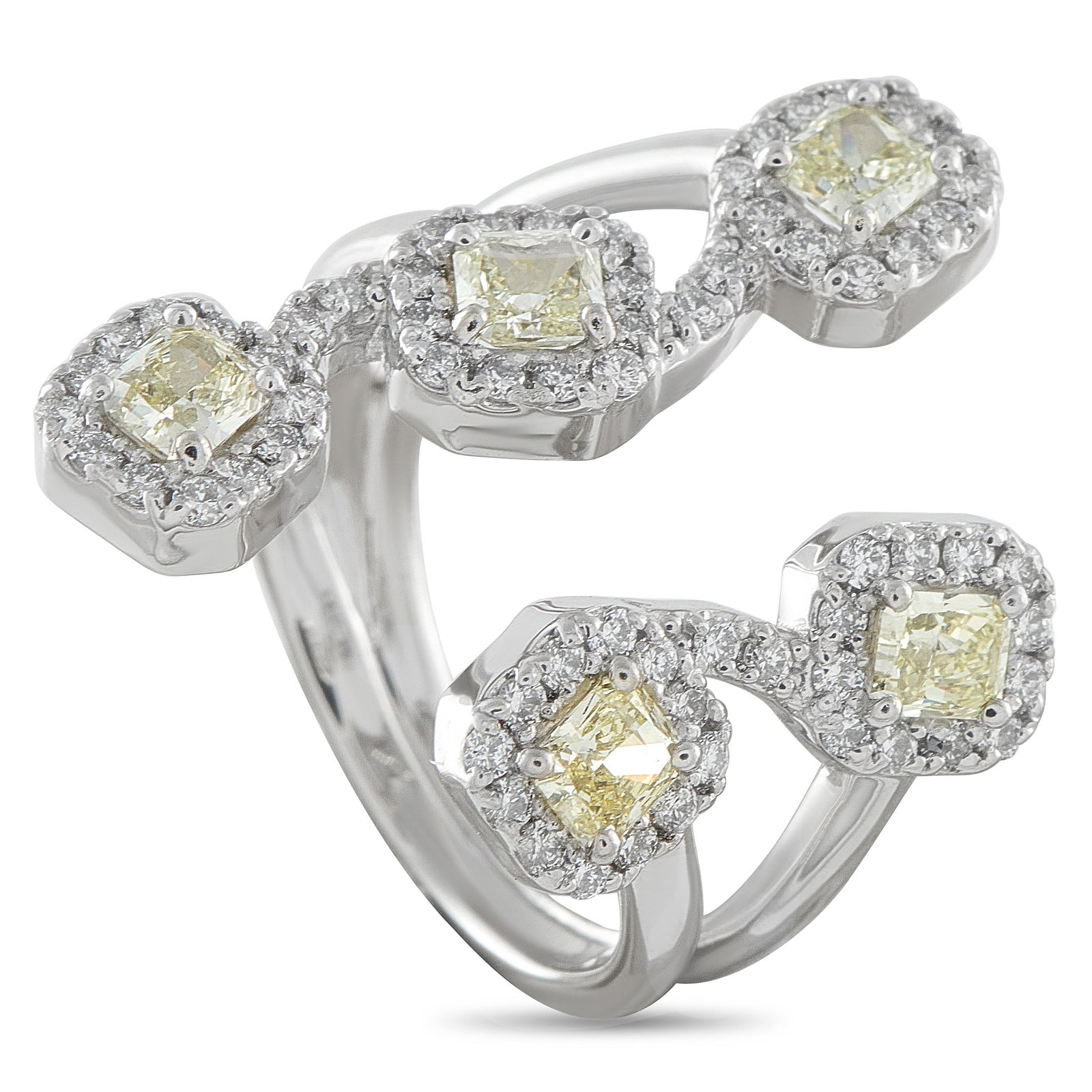 Platinum 1.57ct White and Fancy Yellow Diamond Open Ring: Made with a striking open center design, this dramatic luxury ring exudes contemporary elegance. Fancy Yellow Diamond center stones totaling 0.98 carats add a subtle pop of color, while additional