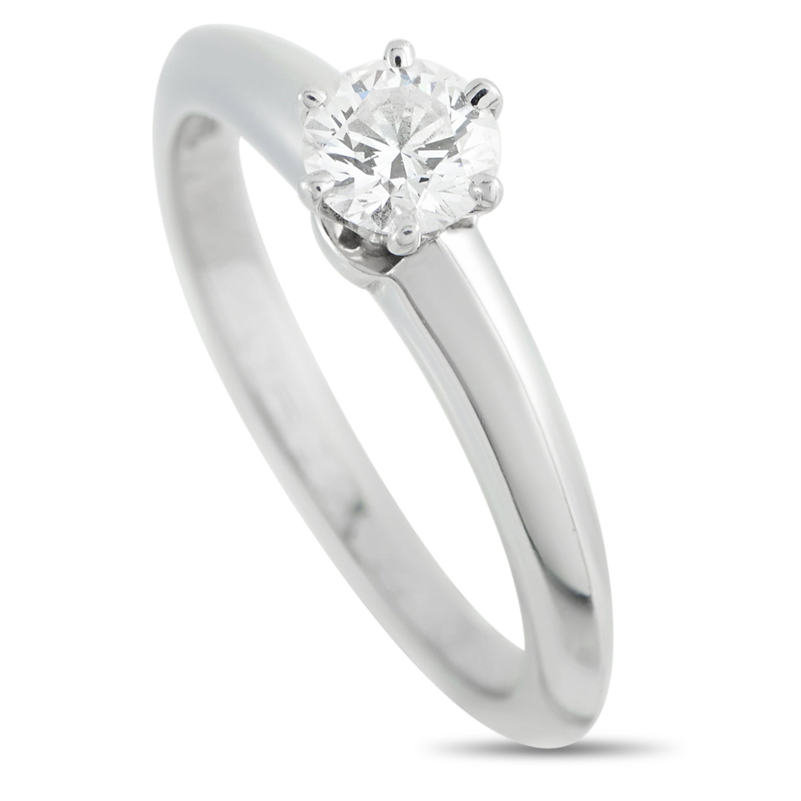 Tiffany & Co. Platinum 0.40ct Diamond Solitaire Ring: This Tiffany & Co. solitaire ring is a timeless piece that will never go out of style. At the center, a 0.40 carat round-cut Diamond is beautifully showcased within a classic 6-prong setting. Crafted 