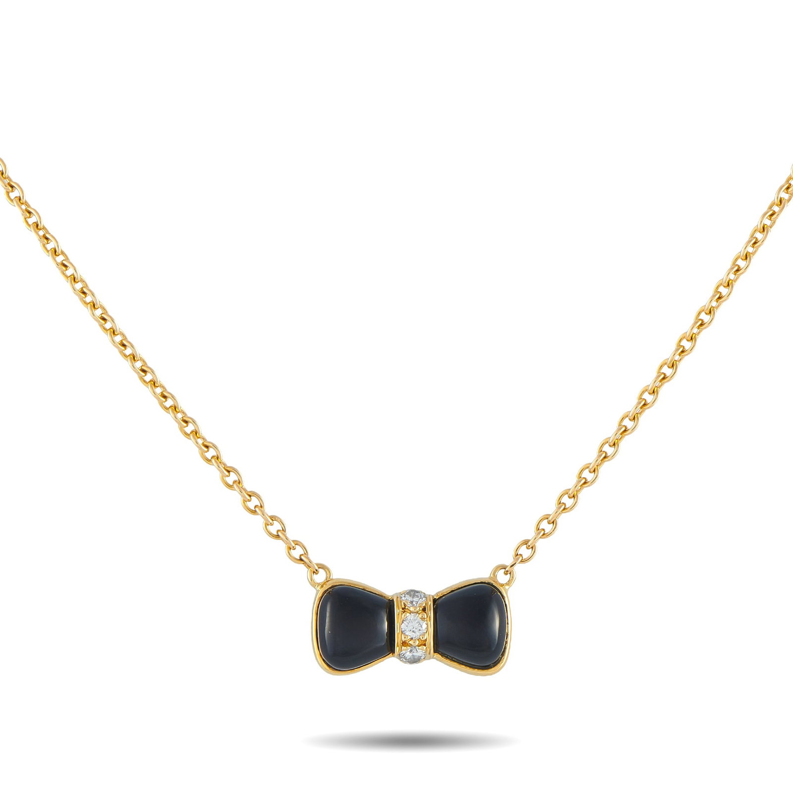 Van Cleef & Arpels 18K Yellow Gold Diamond and Onyx Bow Necklace: A bow-shaped pendant makes this Van Cleef & Arpels necklace incredibly charming. Crafted from 18K Yellow Gold, the feminine design comes to life thanks to Onyx accents and sparkling Diamonds. The pend