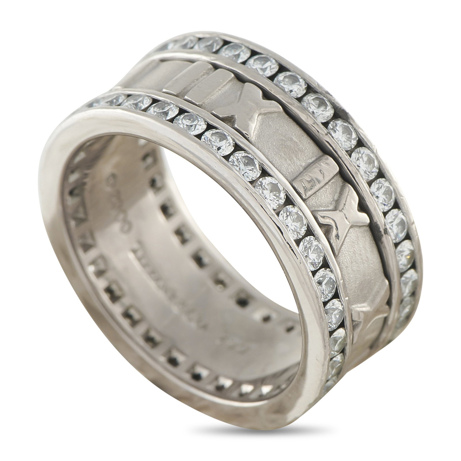 Tiffany & Co. Atlas 18K White Gold 1.65ct Diamond Eternity Ring: Like all pieces from the collection, this Tiffany & Co. Atlas ring features a structural design that is elevated by simple Roman numeral motifs. Diamonds with a total weight of 1.65 carats make a stat