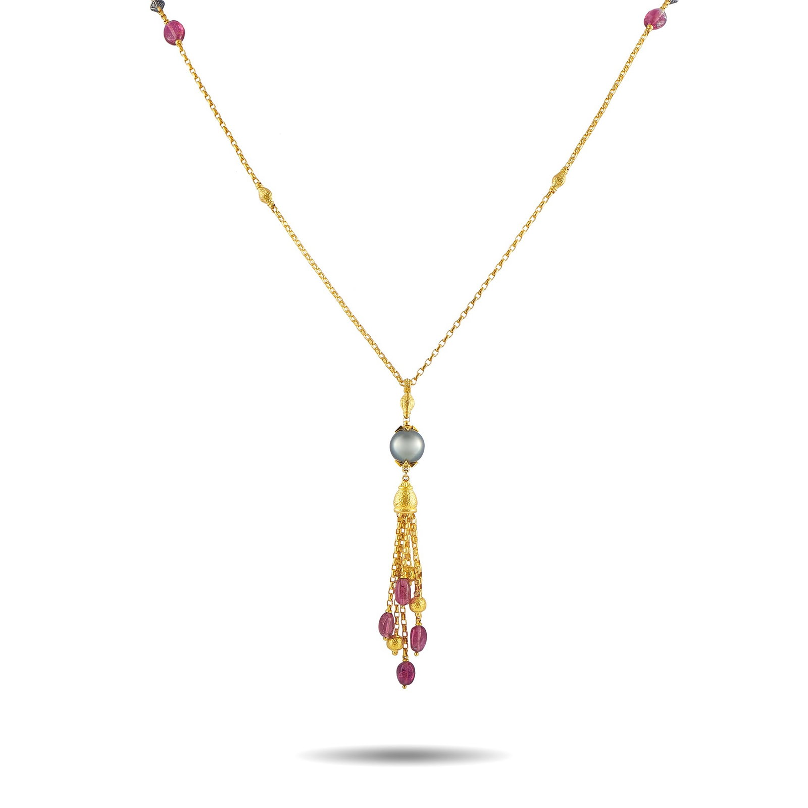 Konstantino 18K Yellow Gold Tahitian Pearl and Tourmaline Necklace: This Konstantino necklace is designed to continually make a statement. Crafted from 18K Yellow Gold, the chain and the central pendant are elevated by Tahitian Pearl accents and Tourmaline gemstones. 