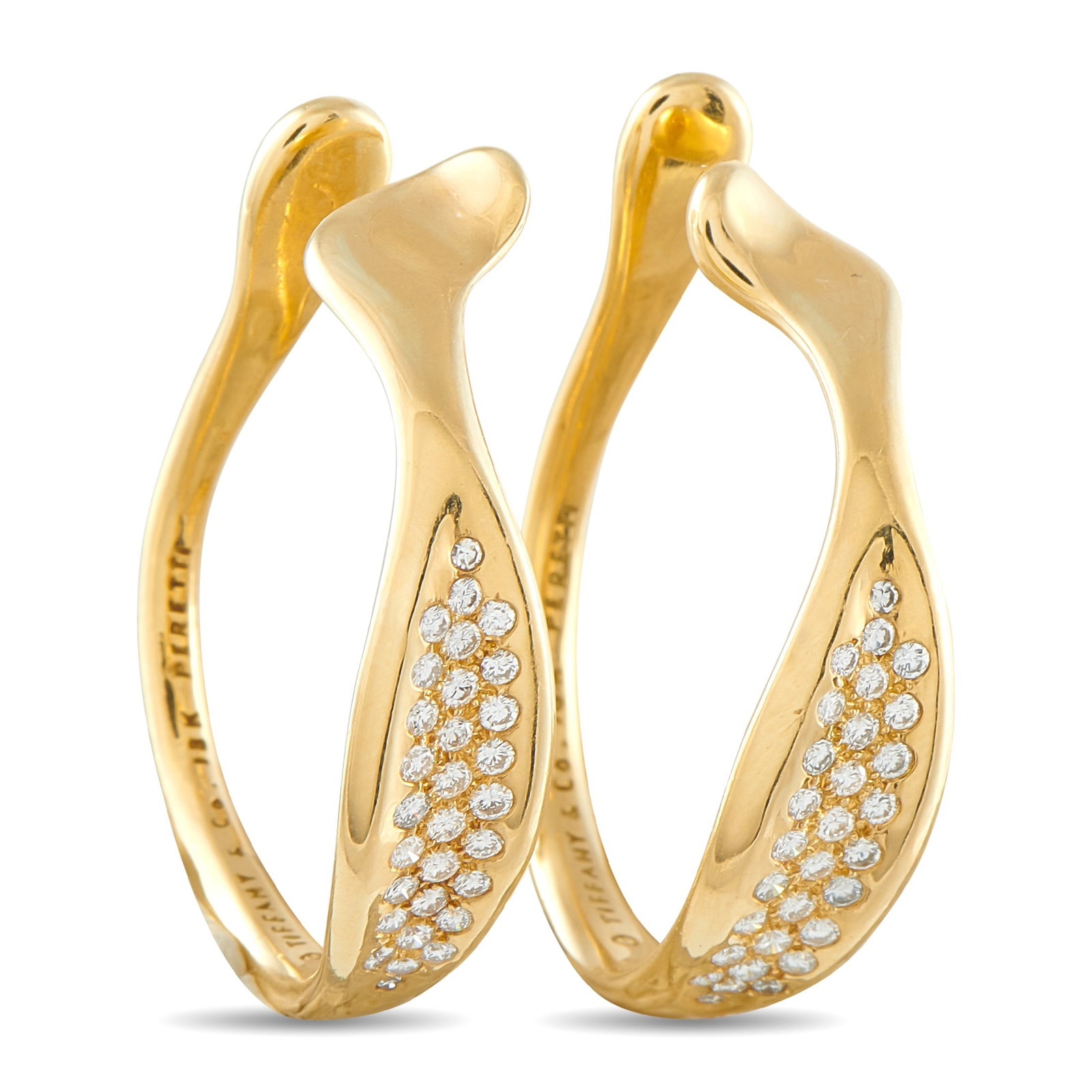 Tiffany & Co. 18K Yellow Gold 0.89ct Diamond Earrings: These Tiffany & Co. earrings will add a subtle touch of luxury to any ensemble. The sleek 18K Yellow Gold settings beautifully showcase inset Diamonds that together possess a total weight of 0.89 cara